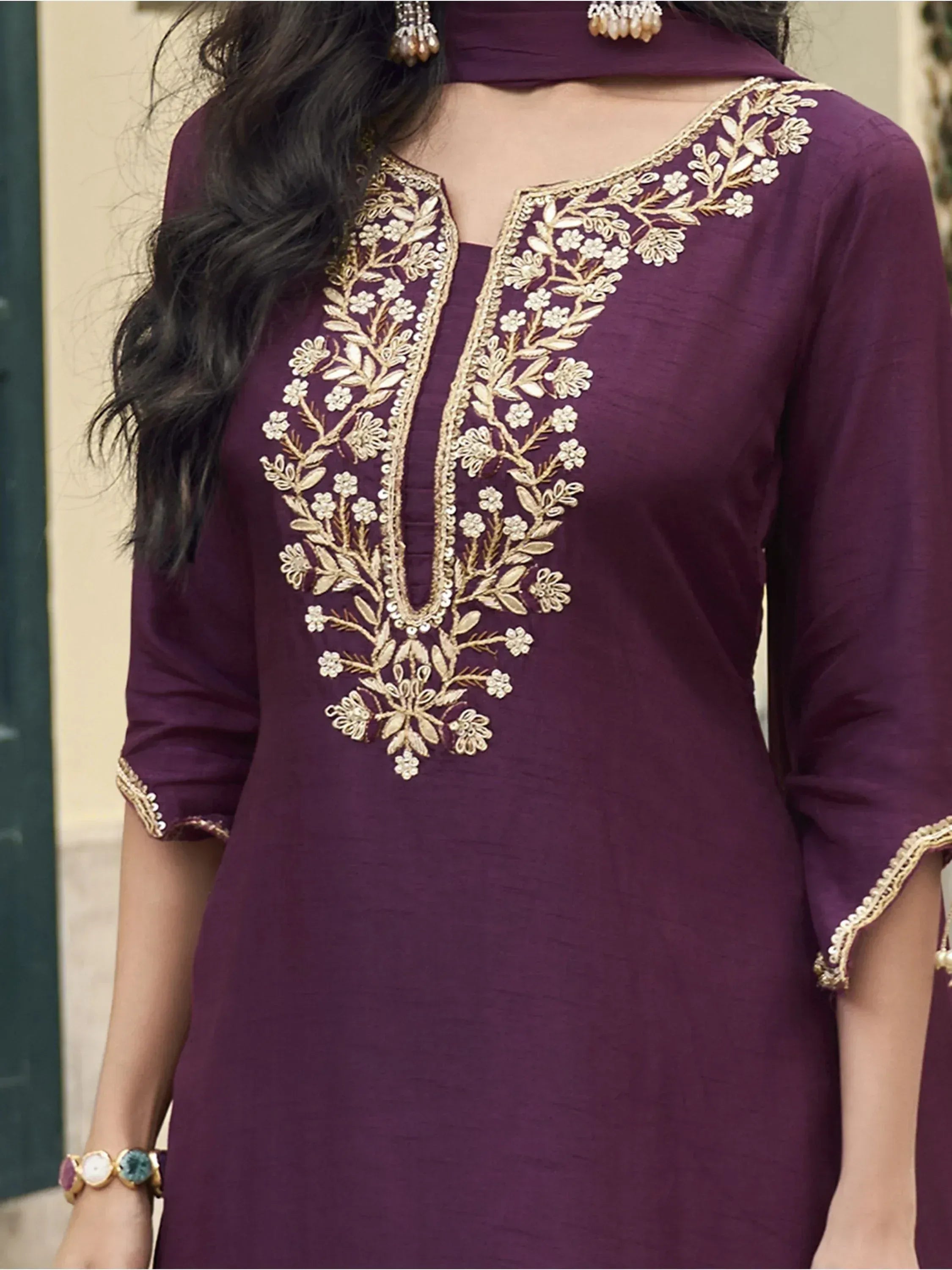 Purple ethnic kurti with gold floral embroidery and V-neck design