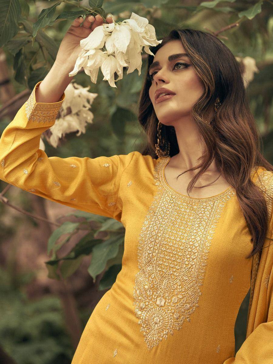 Yellow embroidered ethnic kurti with floral detailing, perfect for Indian festive wear