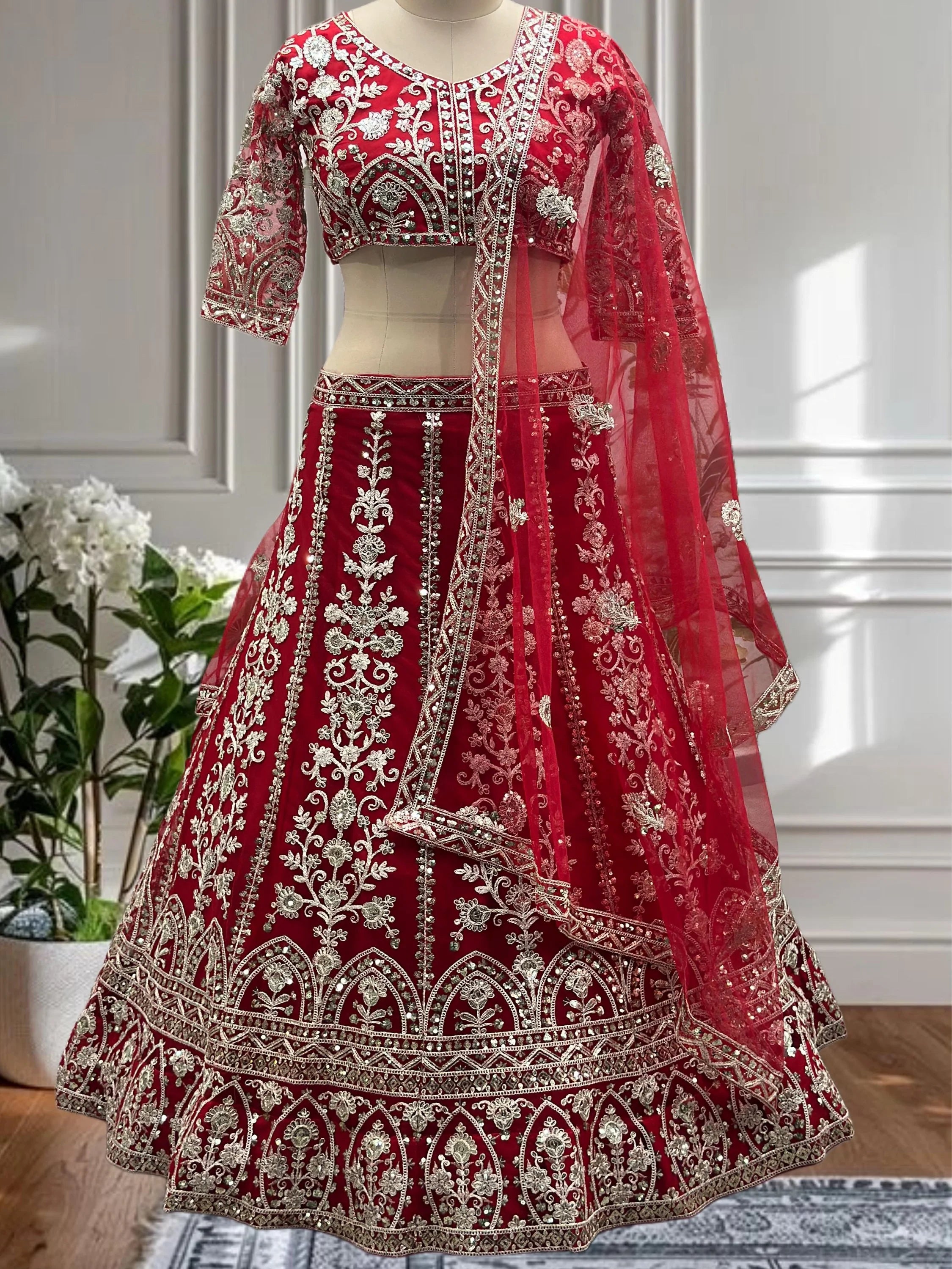 Outstanding Red Net Embroidered Wedding Wear Lehenga Choli