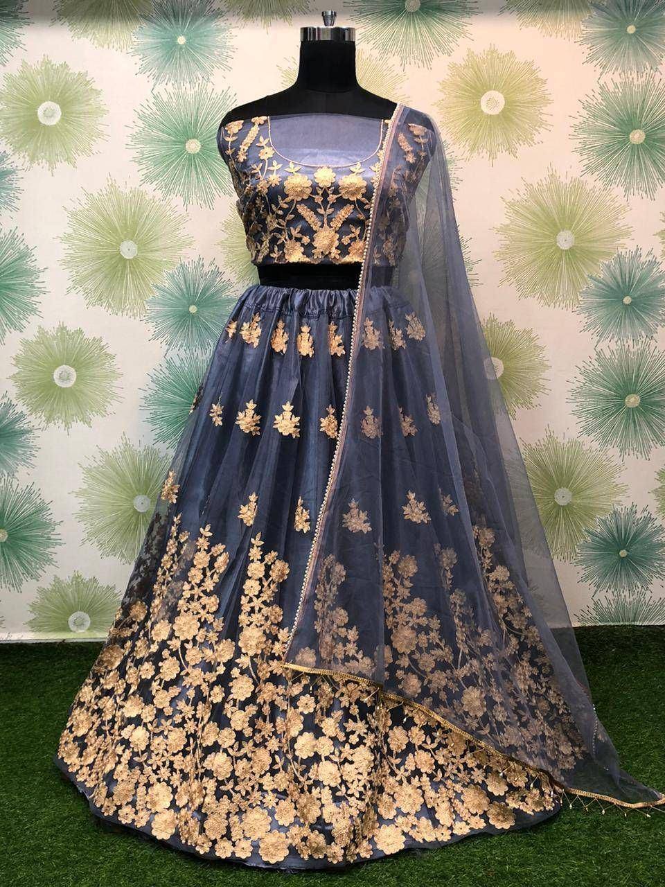 Navy blue lehenga choli with gold floral embroidery, sheer dupatta, ethnic wear for weddings