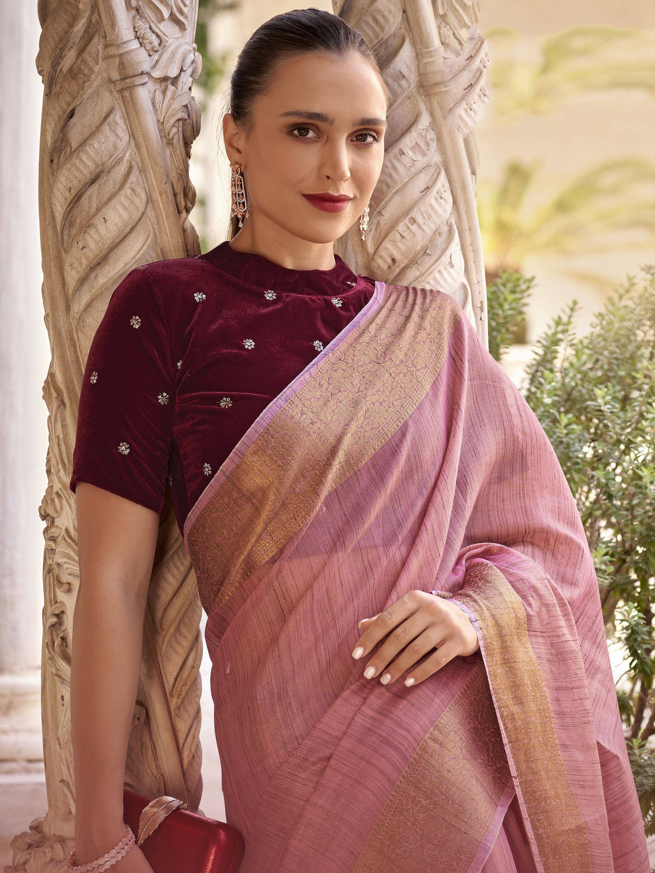 Woman in pink saree with gold border and maroon velvet blouse, Indian ethnic wear