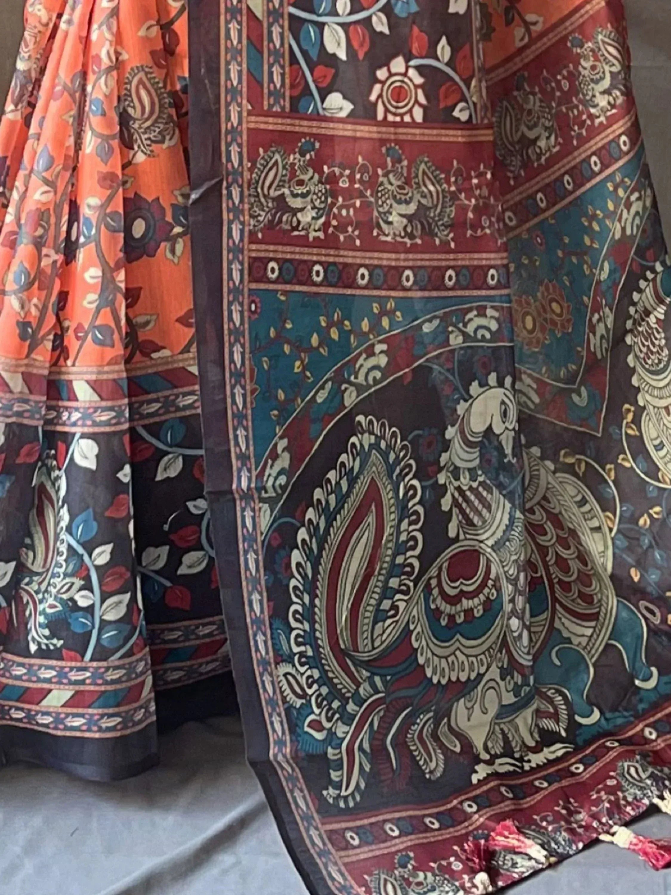 Indian ethnic wear with peacock and floral prints, designer lehenga choli fabric details