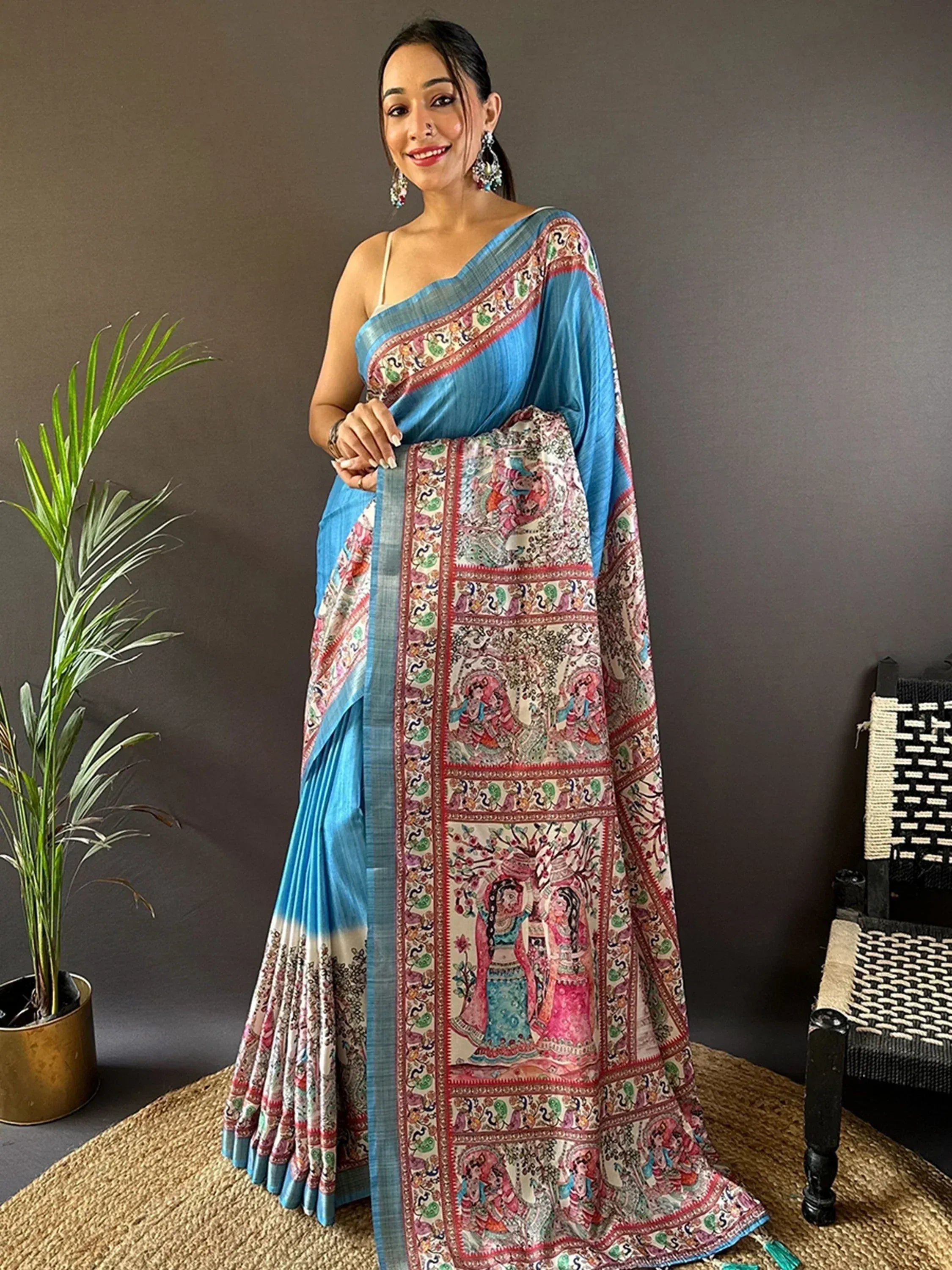 Blue printed saree with intricate ethnic motifs, perfect for Indian festive occasions and traditional wear.