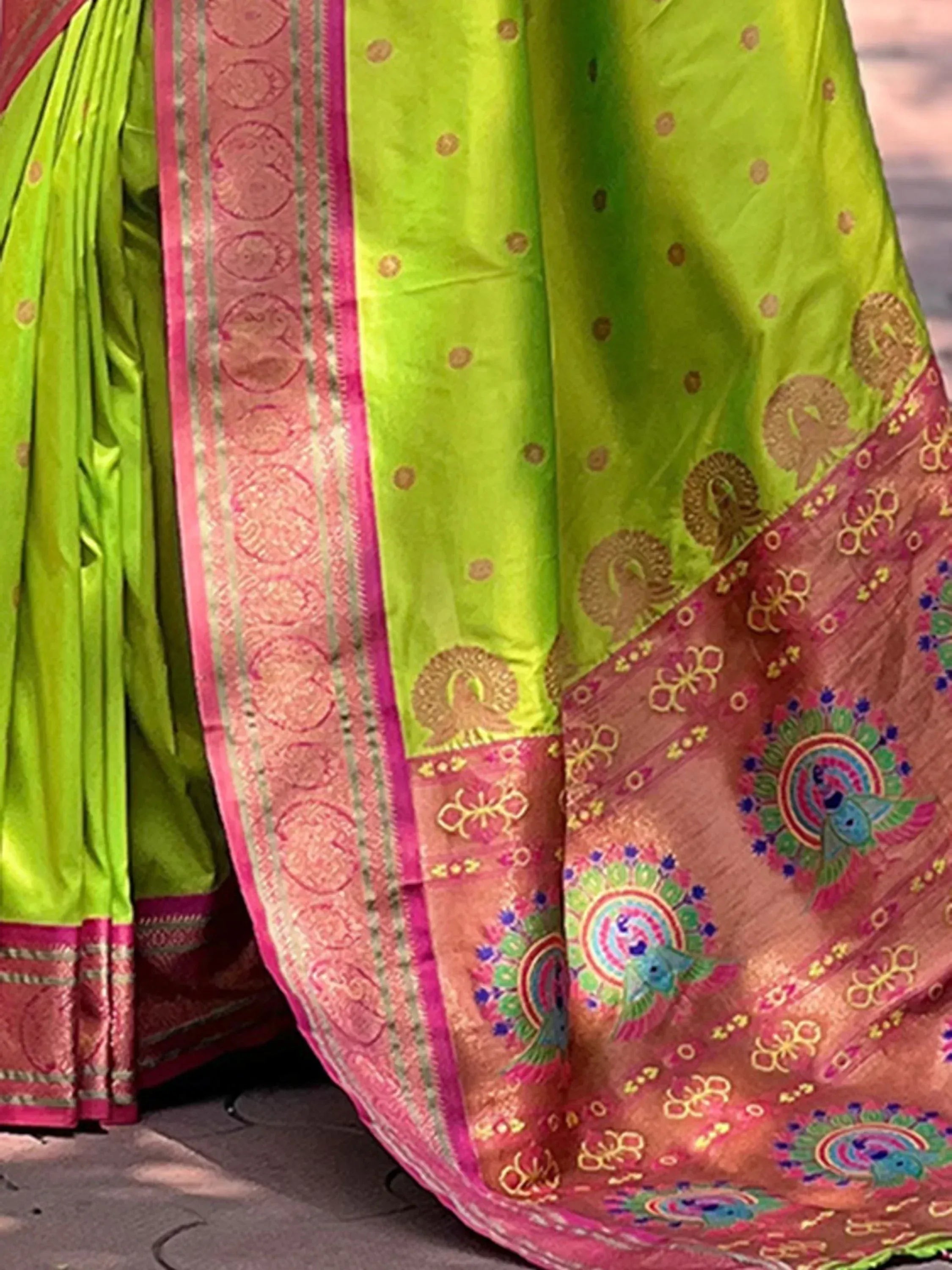 Vibrant green saree with peacock motifs and pink border, Indian ethnic wear