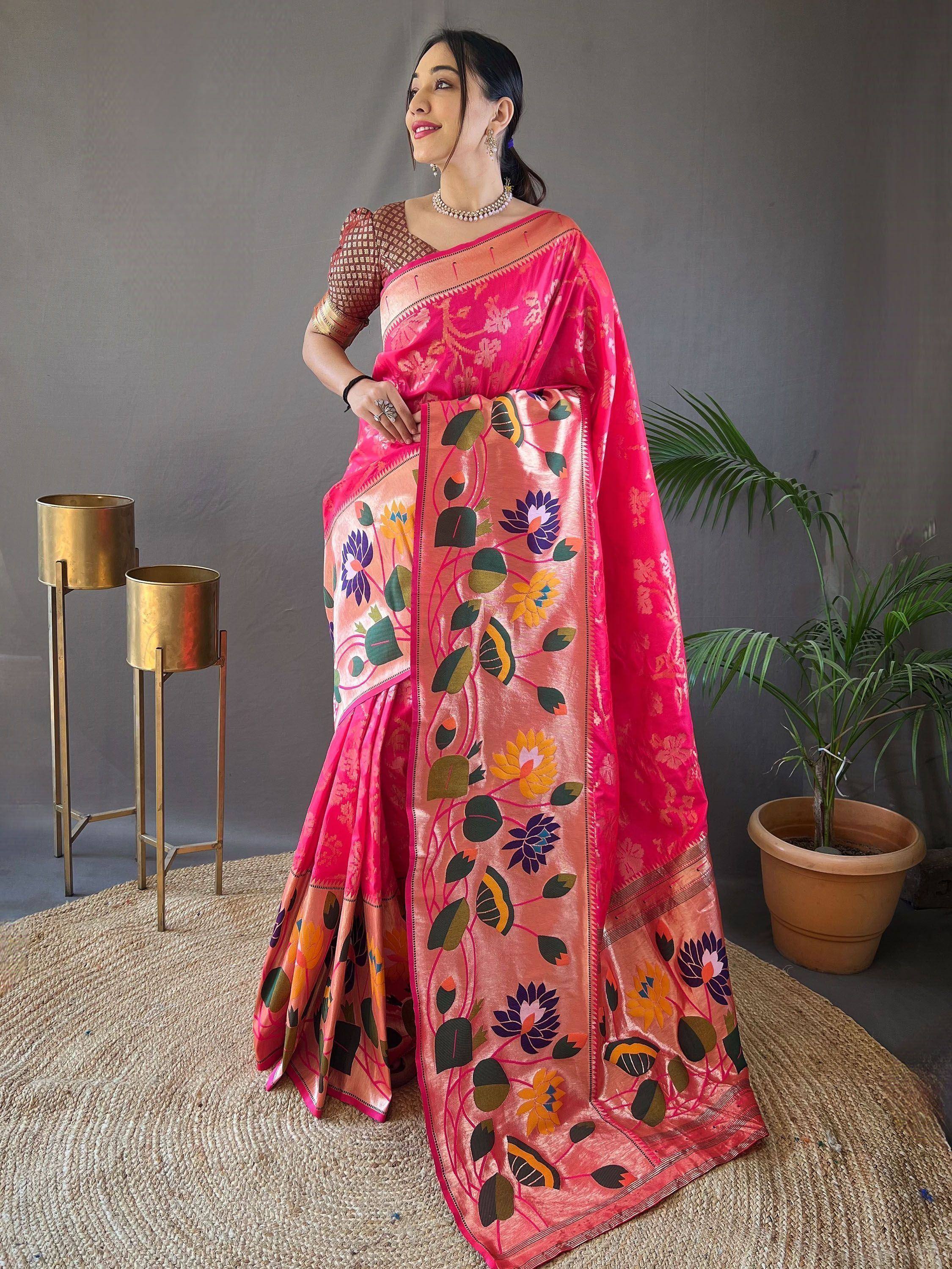 Vibrant pink floral saree with embroidered border, perfect for Indian ethnic occasions