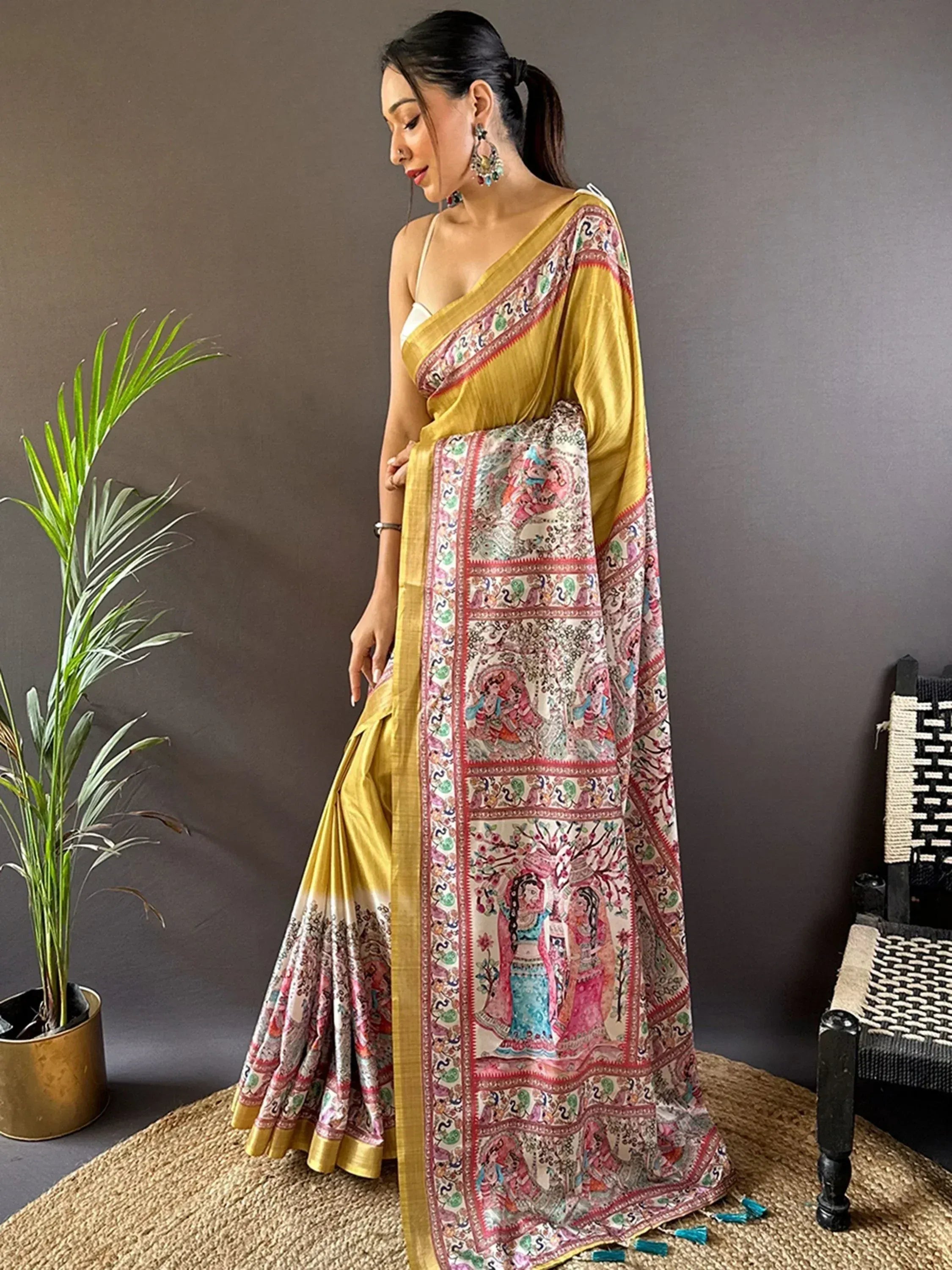Yellow saree with intricate printed border, ethnic Indian wear for women