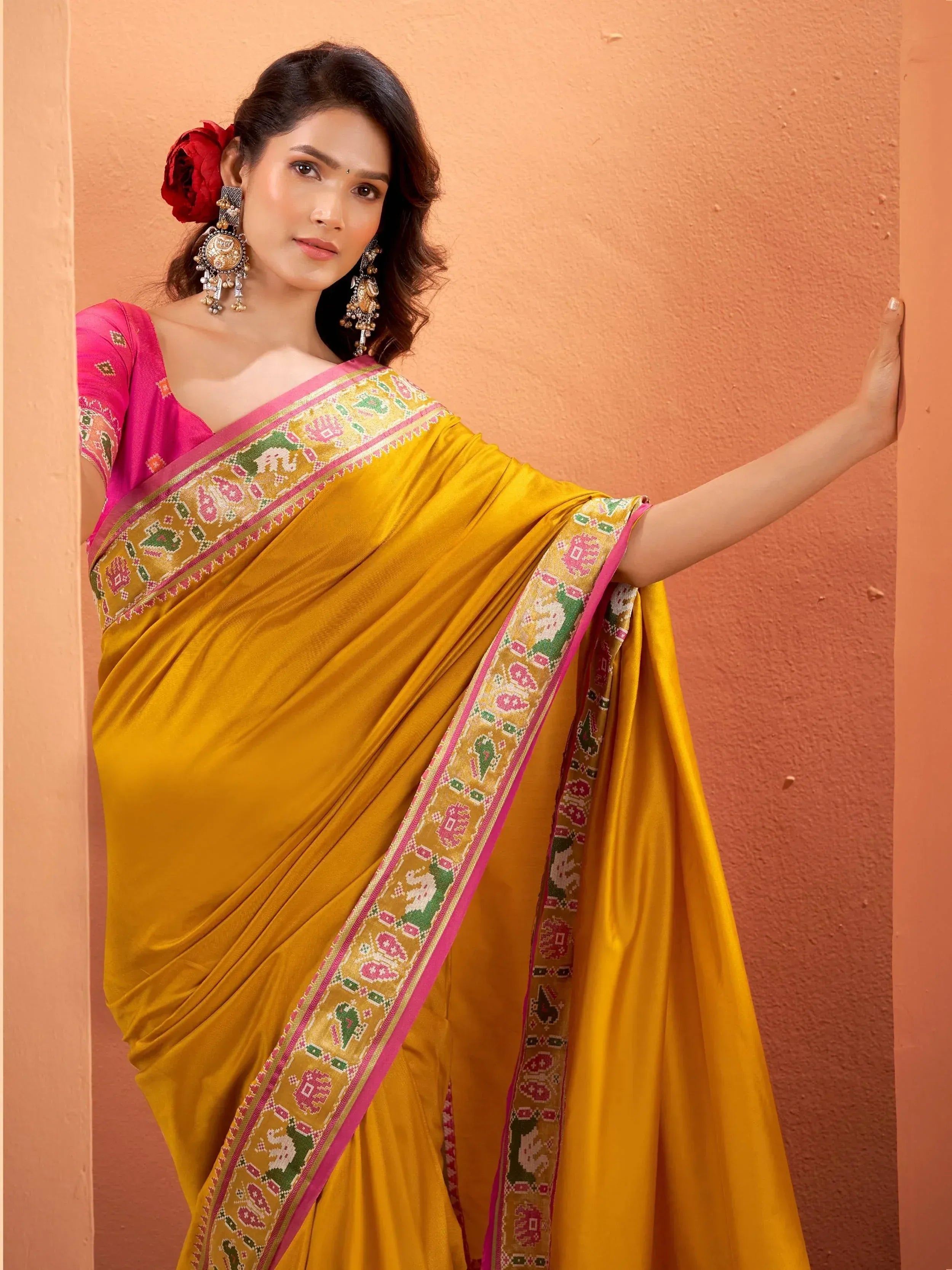 Yellow saree with elephant print border and pink blouse, Indian ethnic wear