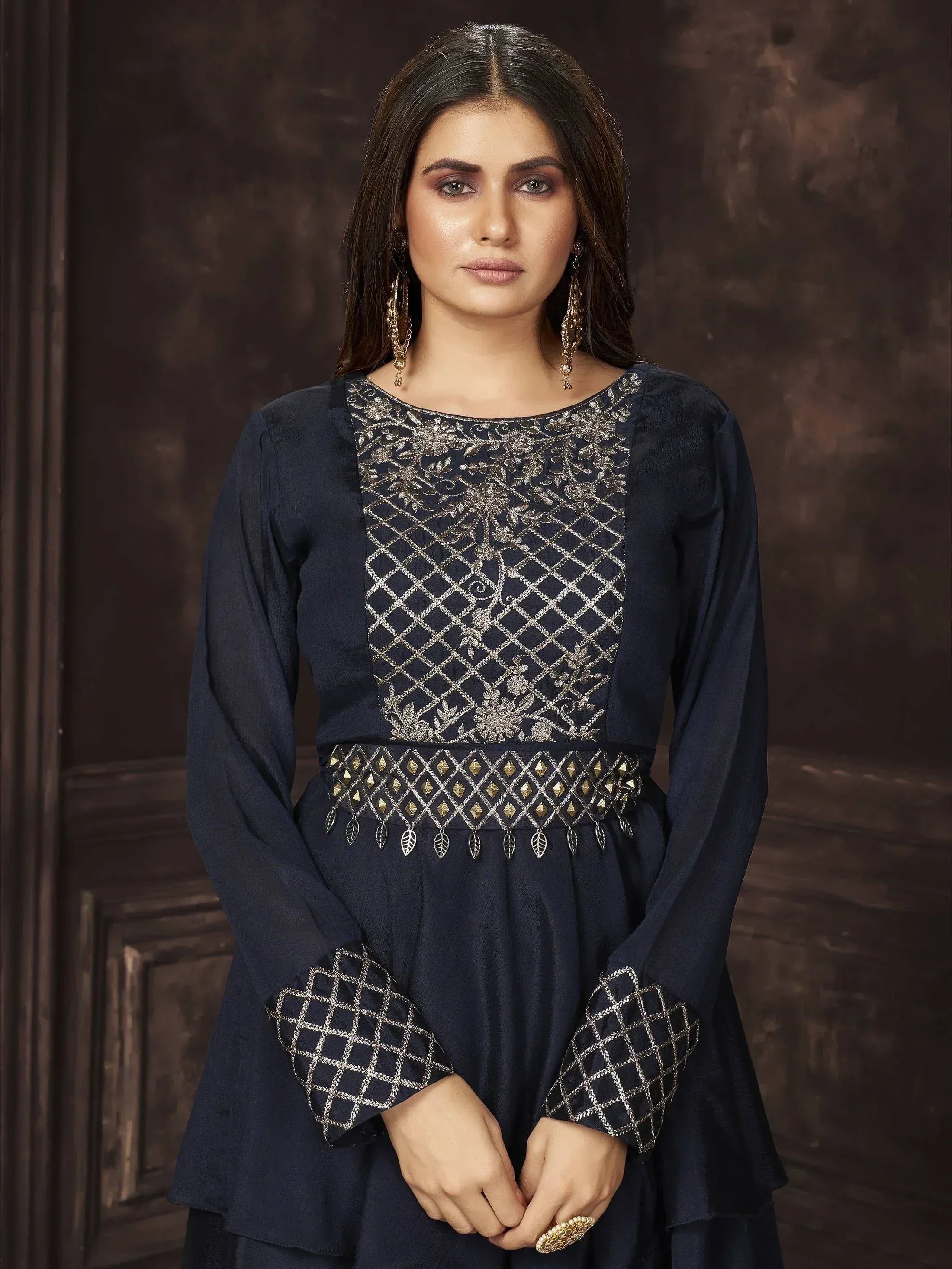 Navy blue ethnic gown with silver embroidery and gold accents, perfect for Indian occasions