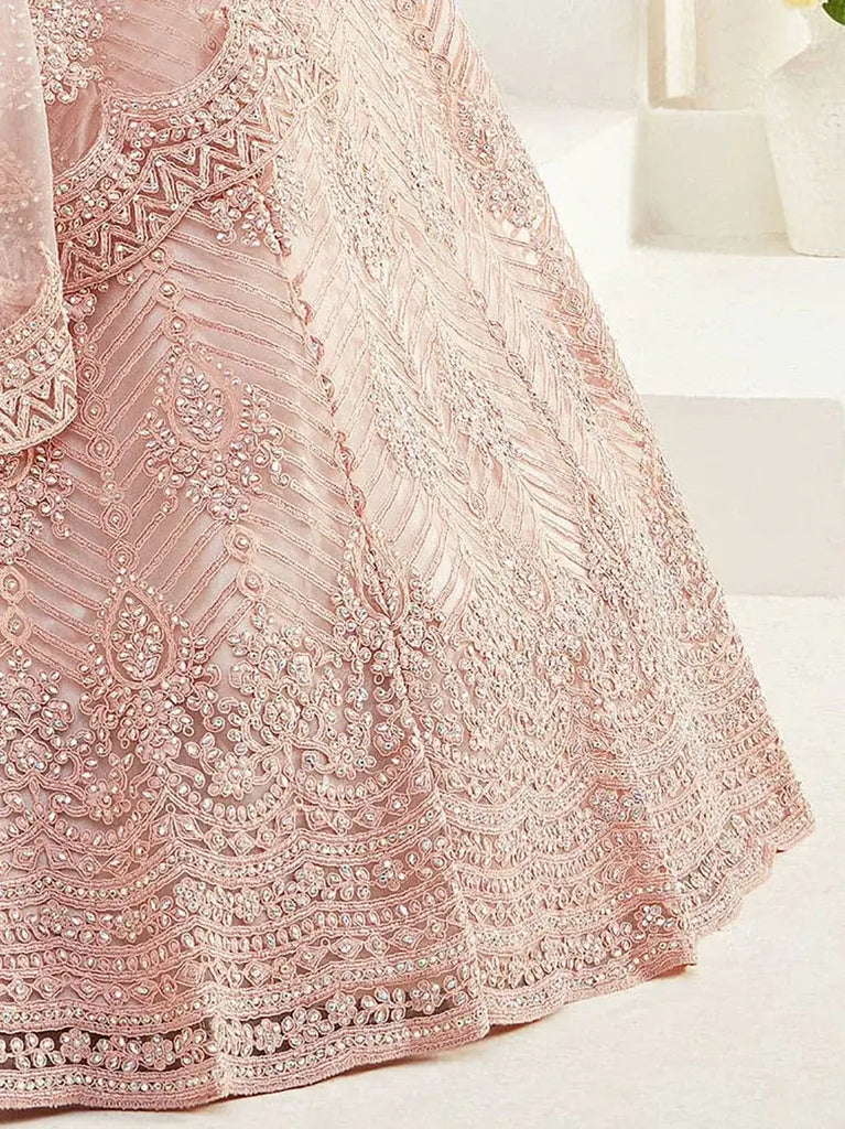 Regal Peach Net Stone Work Wedding Wear Lehenga Choli With Dupatta