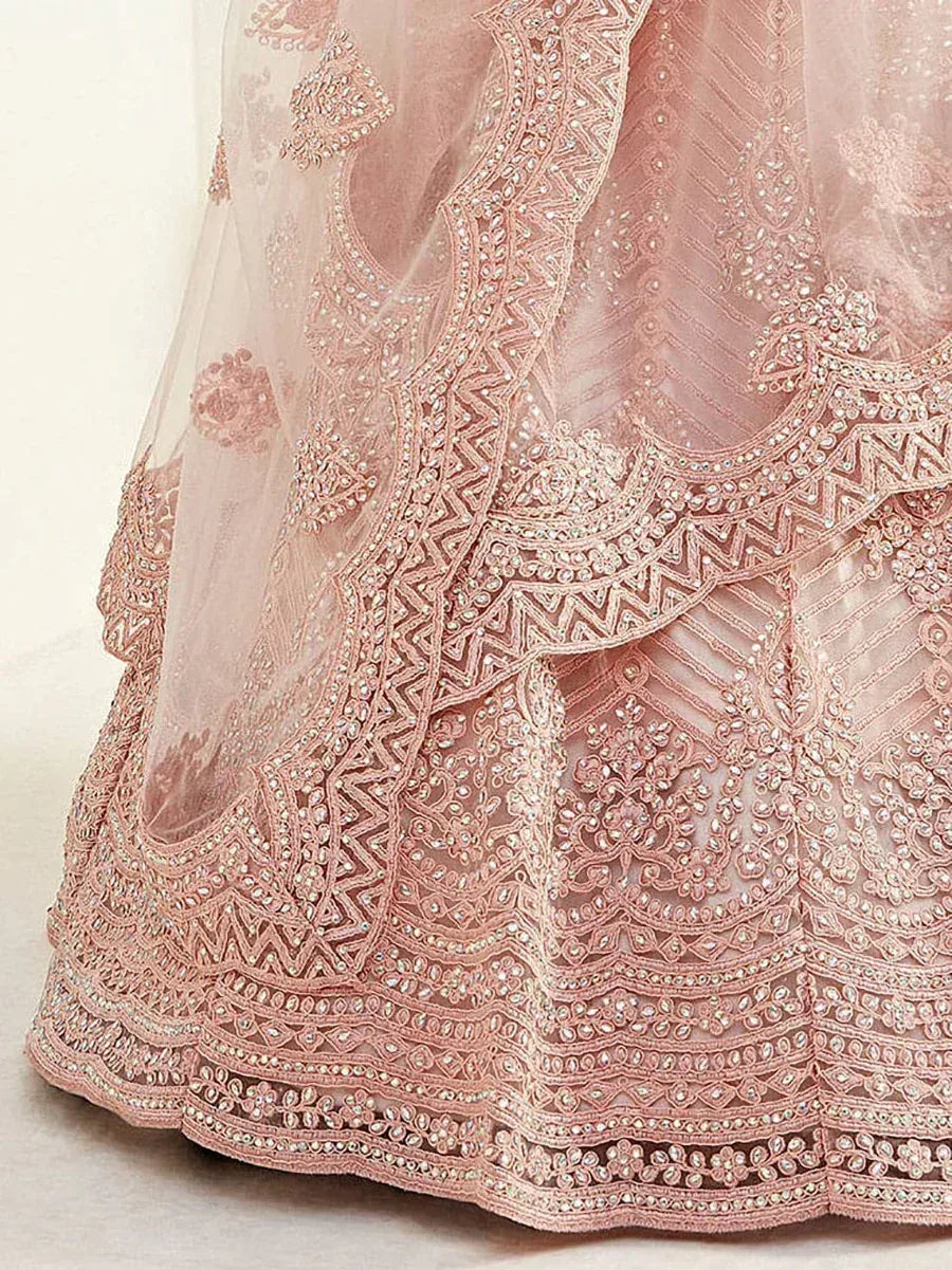 Pink embroidered lehenga with intricate beadwork and lace detailing for Indian ethnic wear
