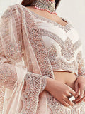 Regal Peach Net Stone Work Wedding Wear Lehenga Choli With Dupatta