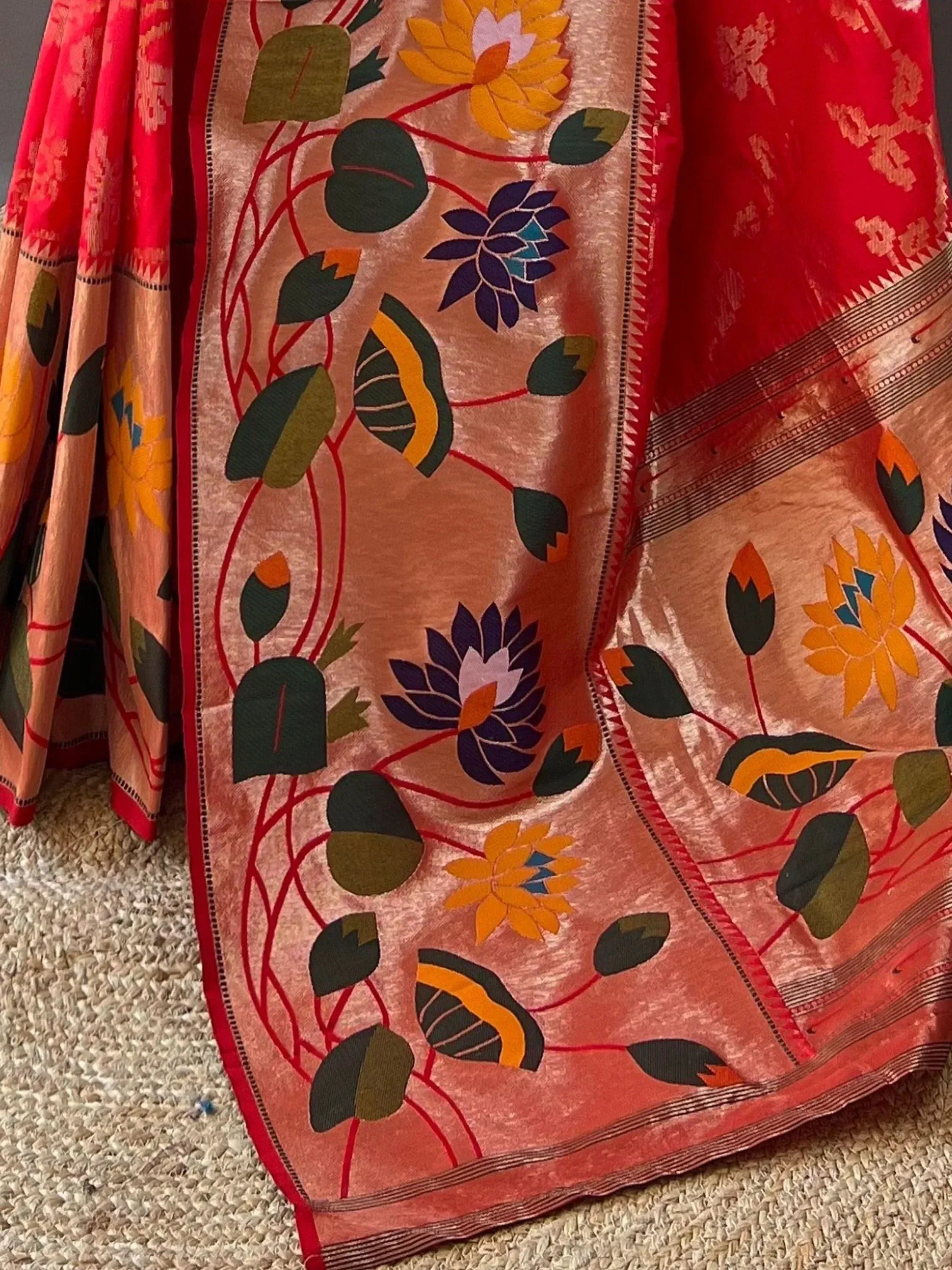 Vibrant floral print saree with lotus motifs, perfect for Indian ethnic wear occasions