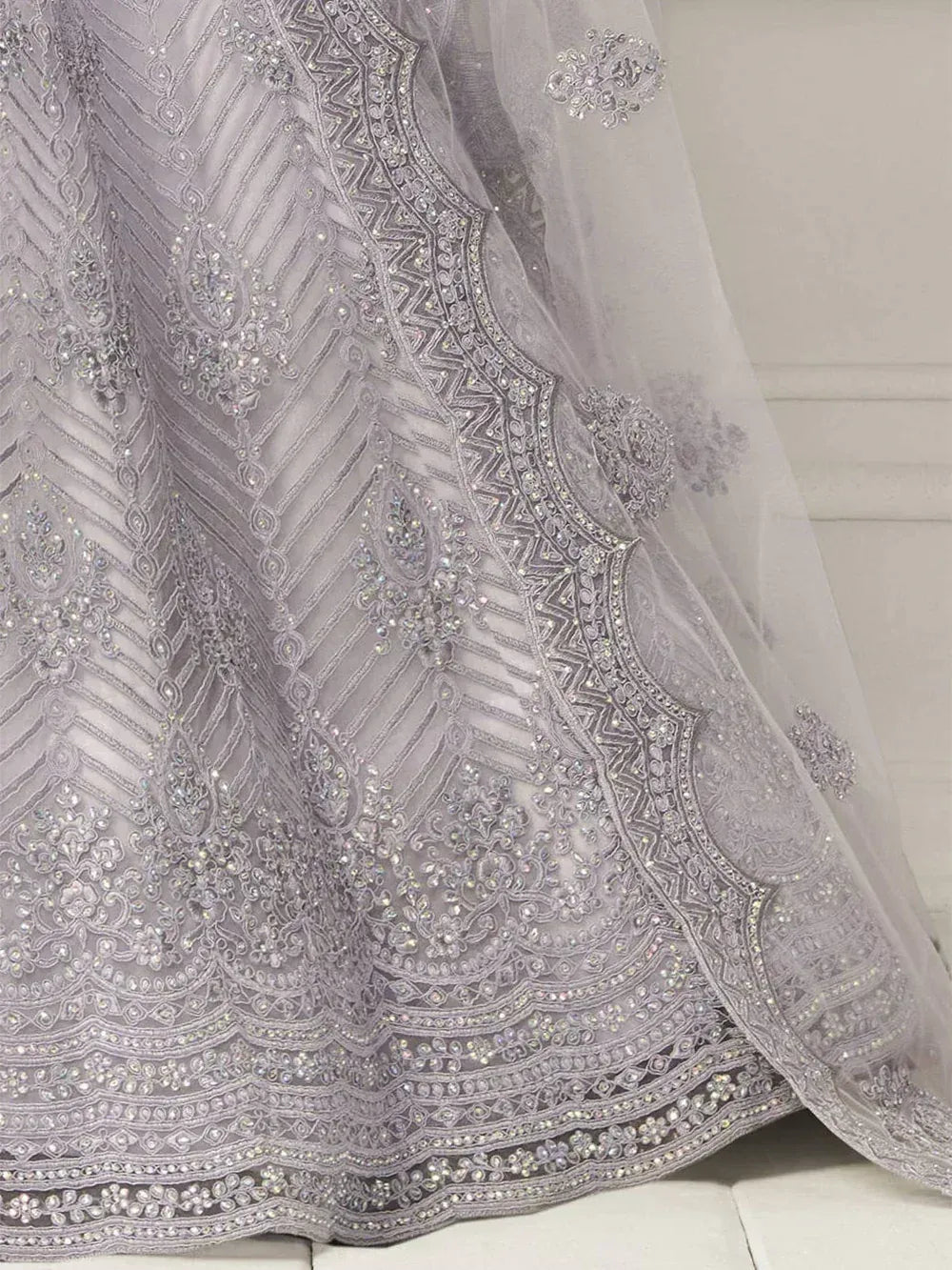Lavender Heavy Thread Coding Work Net Bridal Lehenga Choli