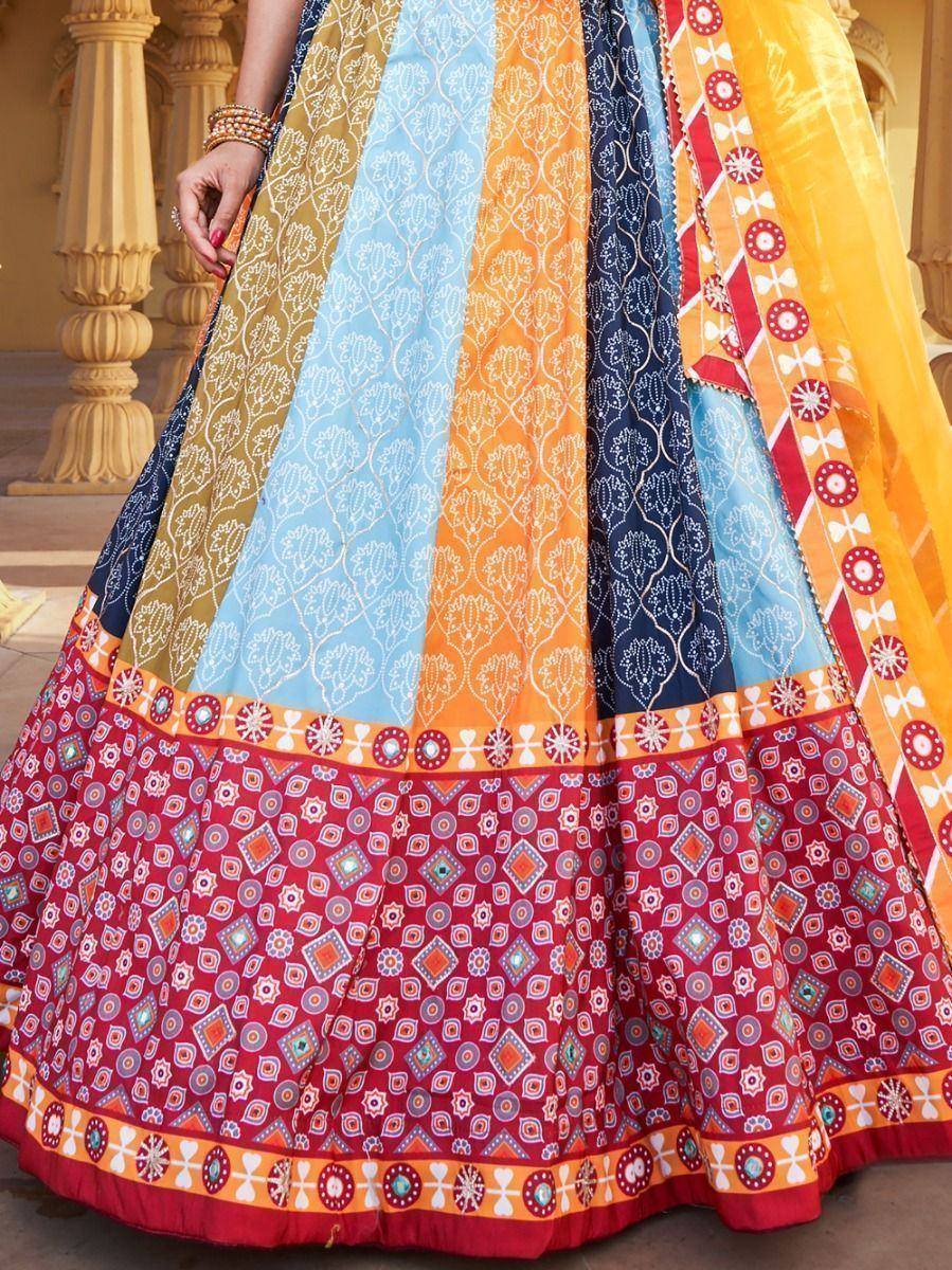 Colorful Indian lehenga with block print patterns and vibrant border designs, perfect for festive occasions.