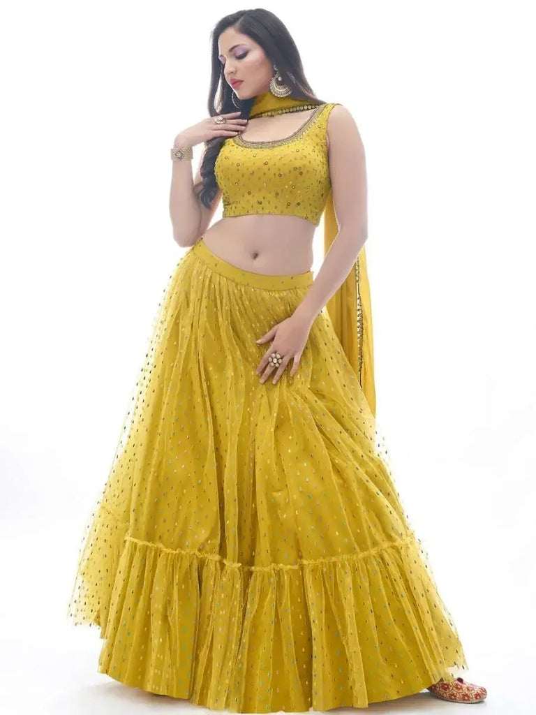 Delightful Mustard Yellow Ruffle Work Soft Net Lehenga Choli