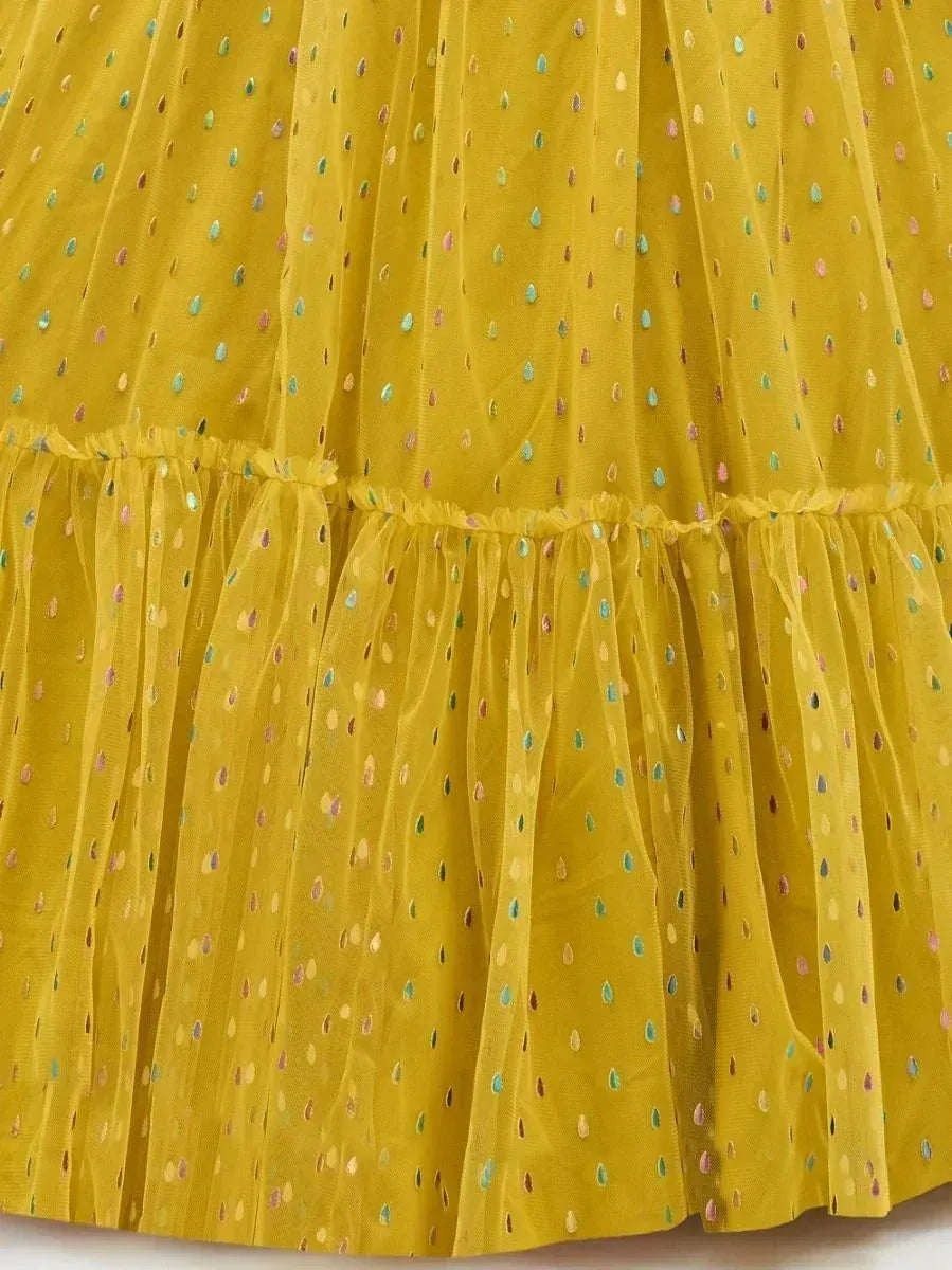 Yellow ethnic gown with colorful dot embroidery and layered tulle skirt