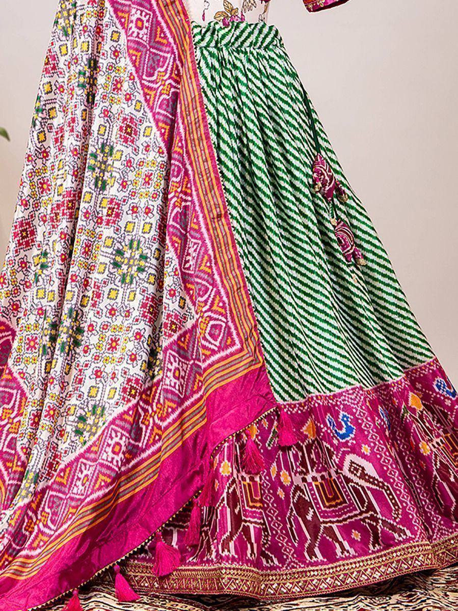 Vibrant Indian ethnic lehenga with green stripes, pink elephant print, and floral dupatta for festive occasions