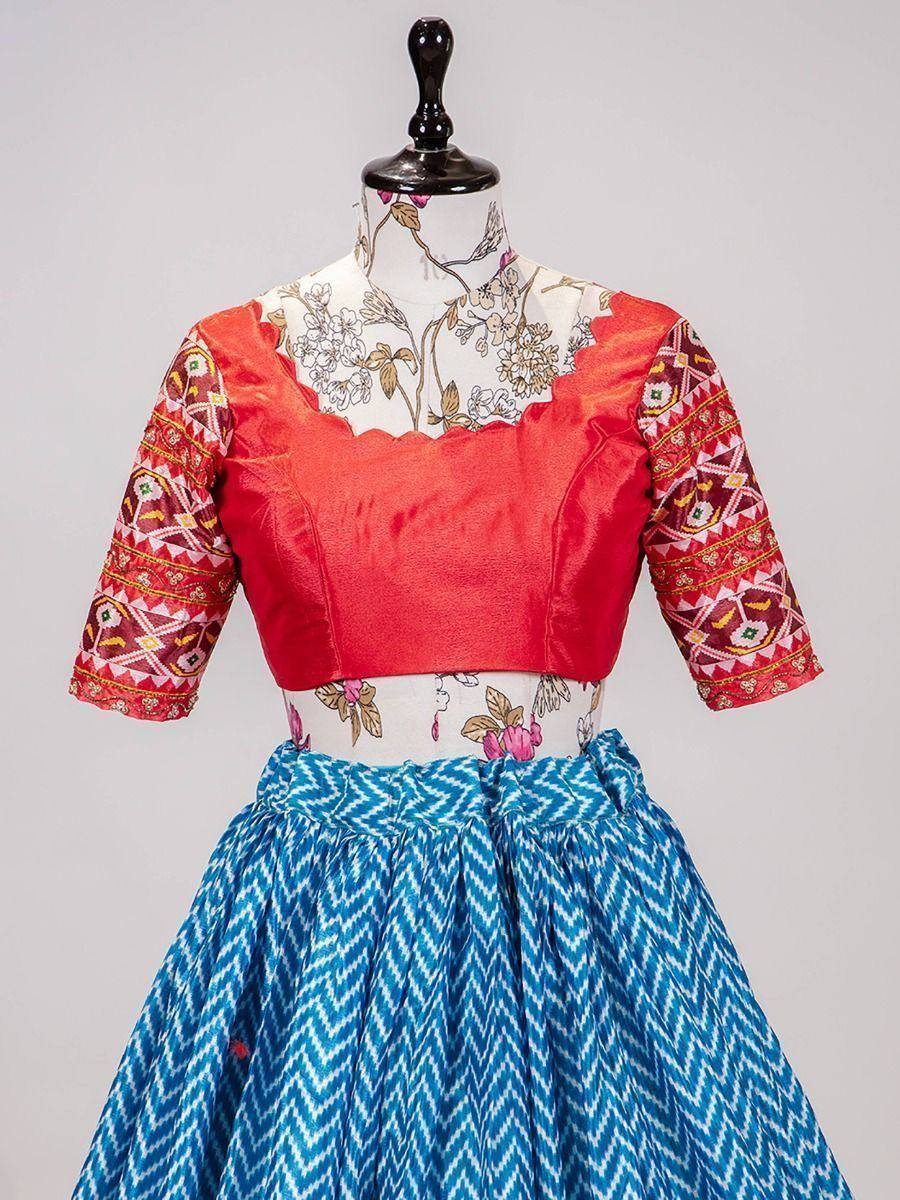 Red embroidered blouse with blue ikat skirt, Indian ethnic wear