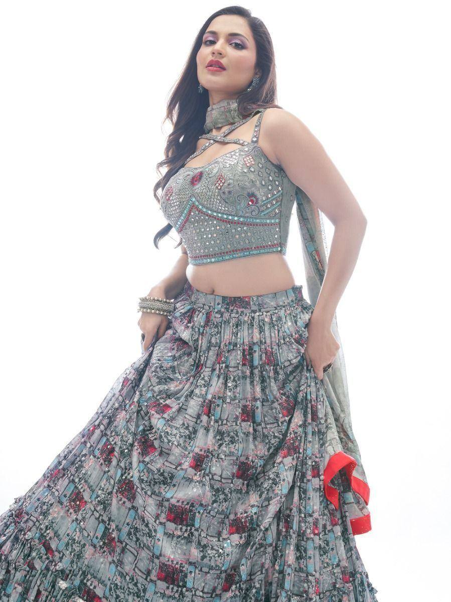 Designer lehenga choli with intricate embroidery and floral print skirt, perfect for Indian ethnic wear occasions