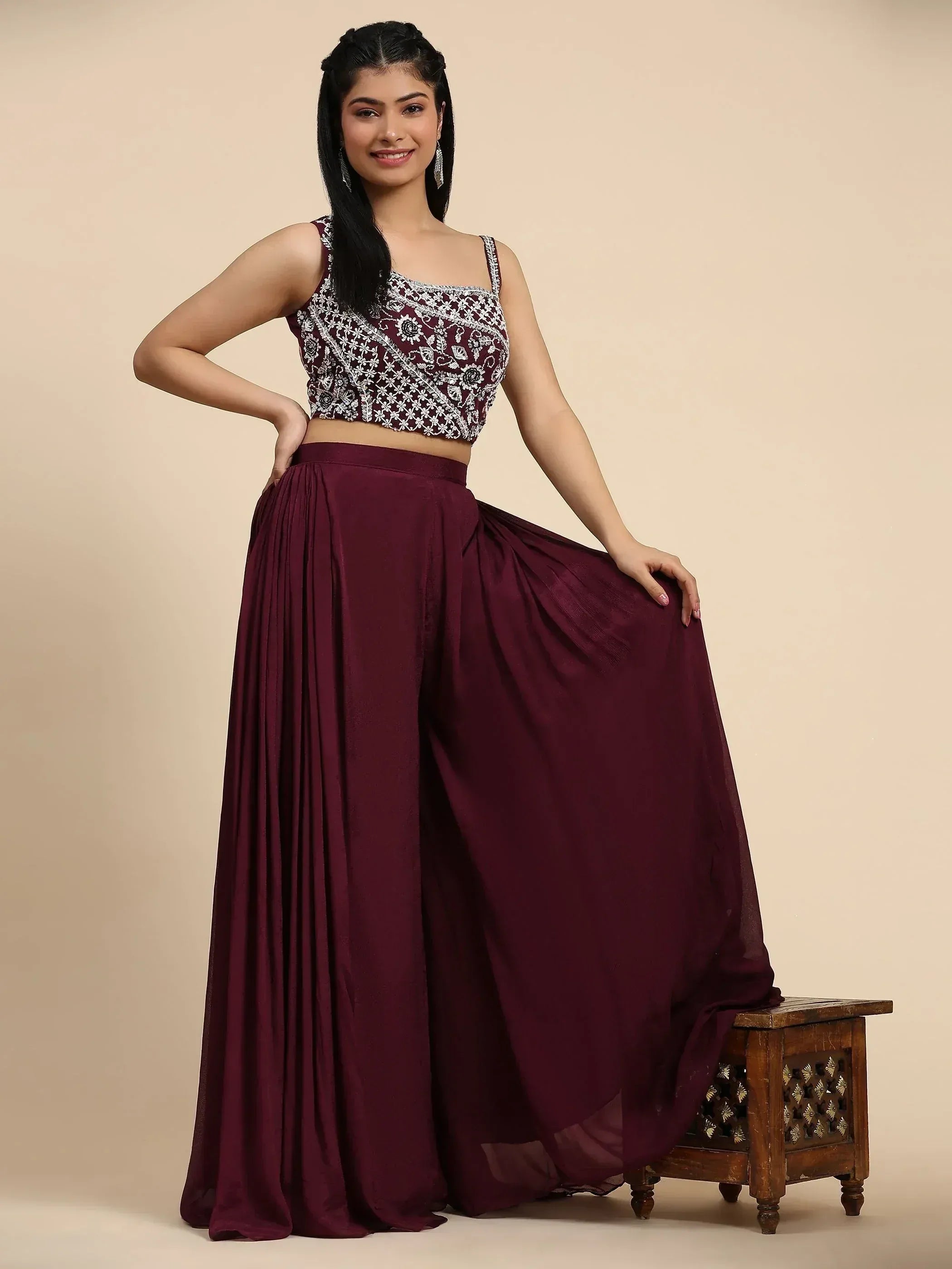 Maroon ethnic gown with embroidered crop top and flowing skirt