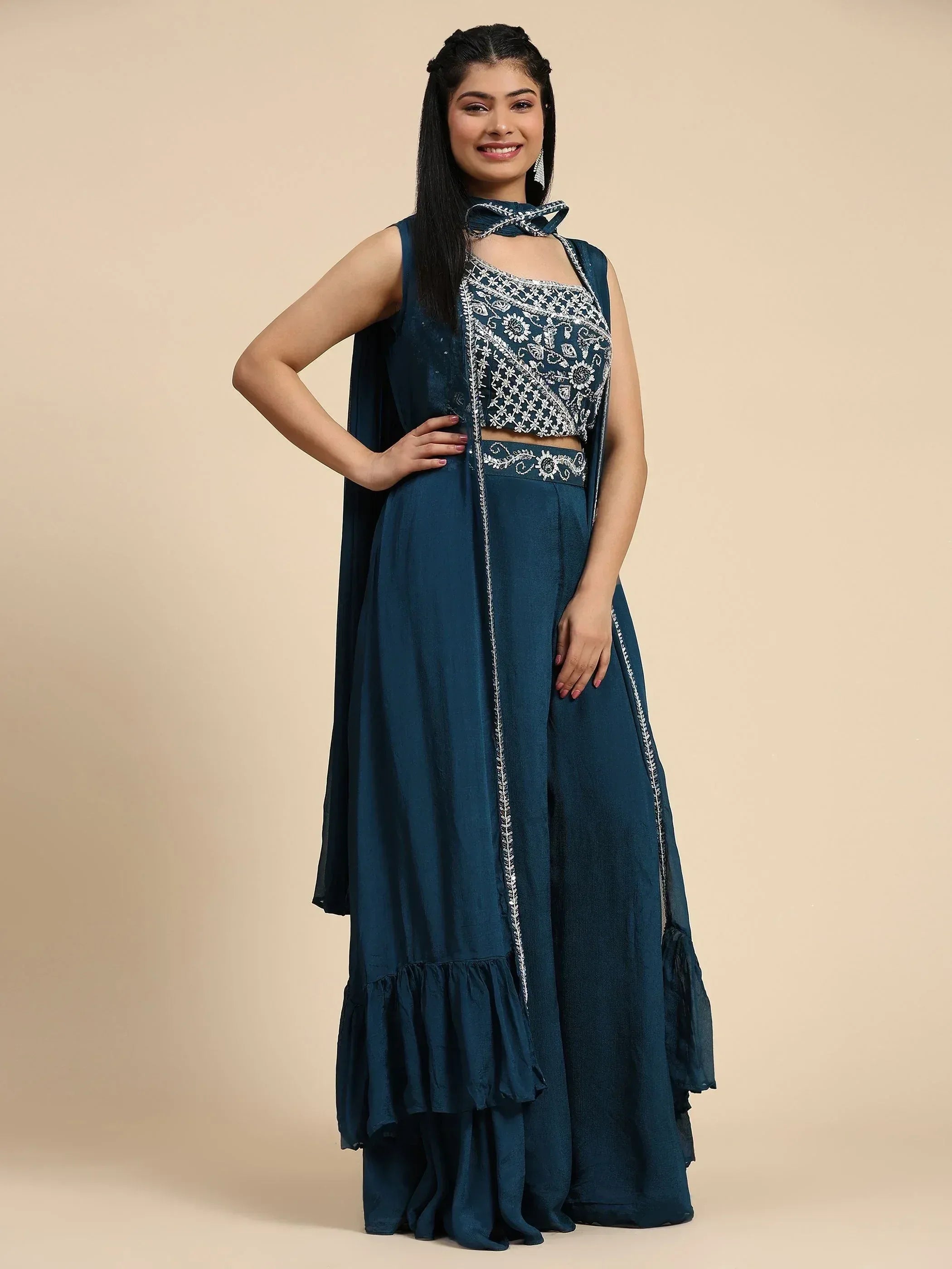 Teal blue embroidered ethnic gown with ruffled hem and matching dupatta, perfect for Indian occasions