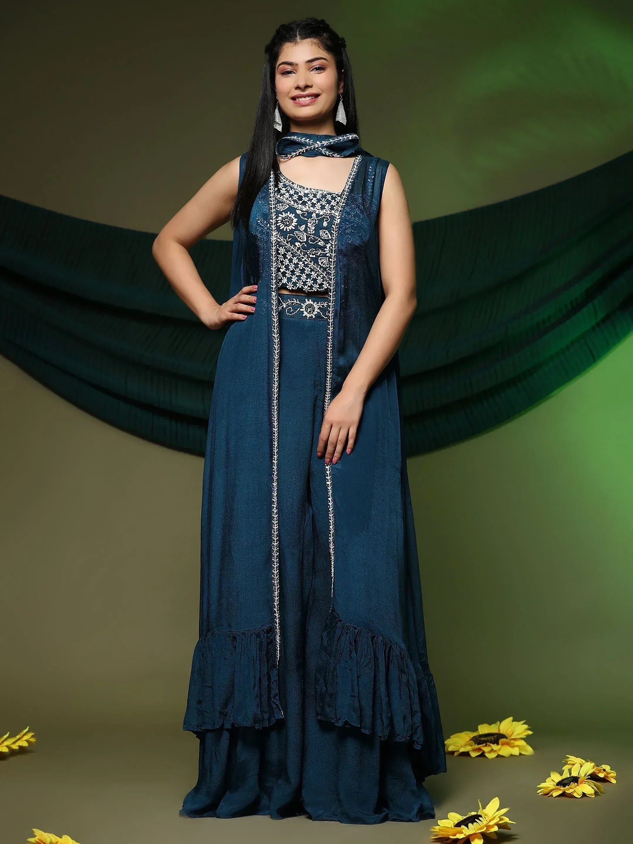 Blue embroidered ethnic palazzo suit with ruffled hem and dupatta, perfect for Indian occasions