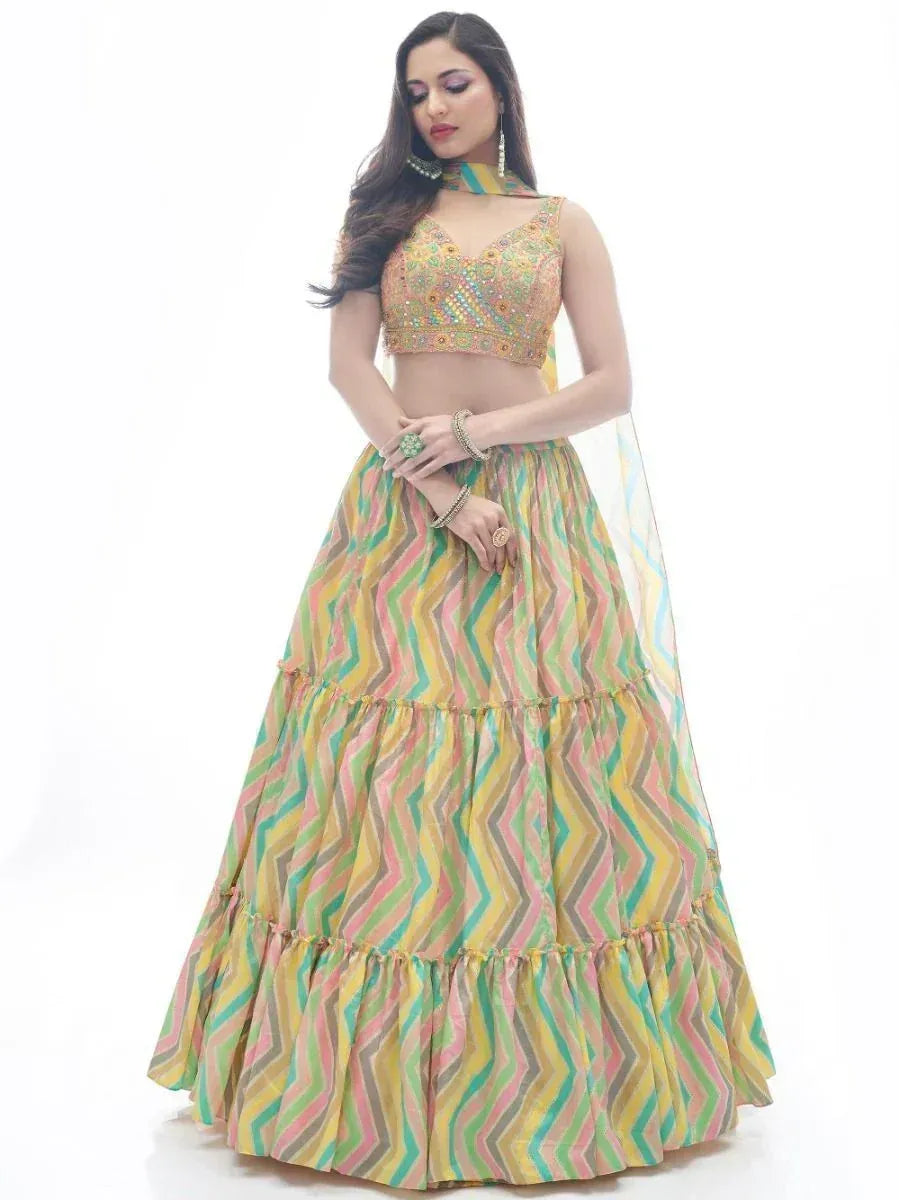 Colorful zigzag print lehenga choli with embroidered crop top and tiered skirt, perfect for Indian ethnic wear