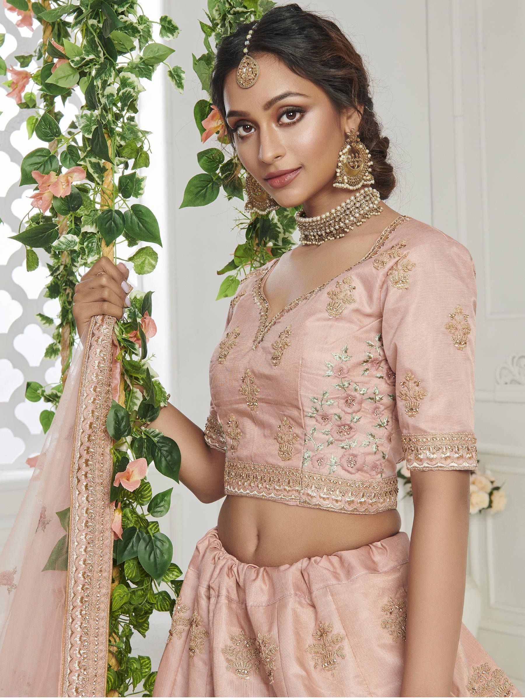 Pink embroidered lehenga choli with gold detailing, perfect for Indian ethnic wear and festive occasions.