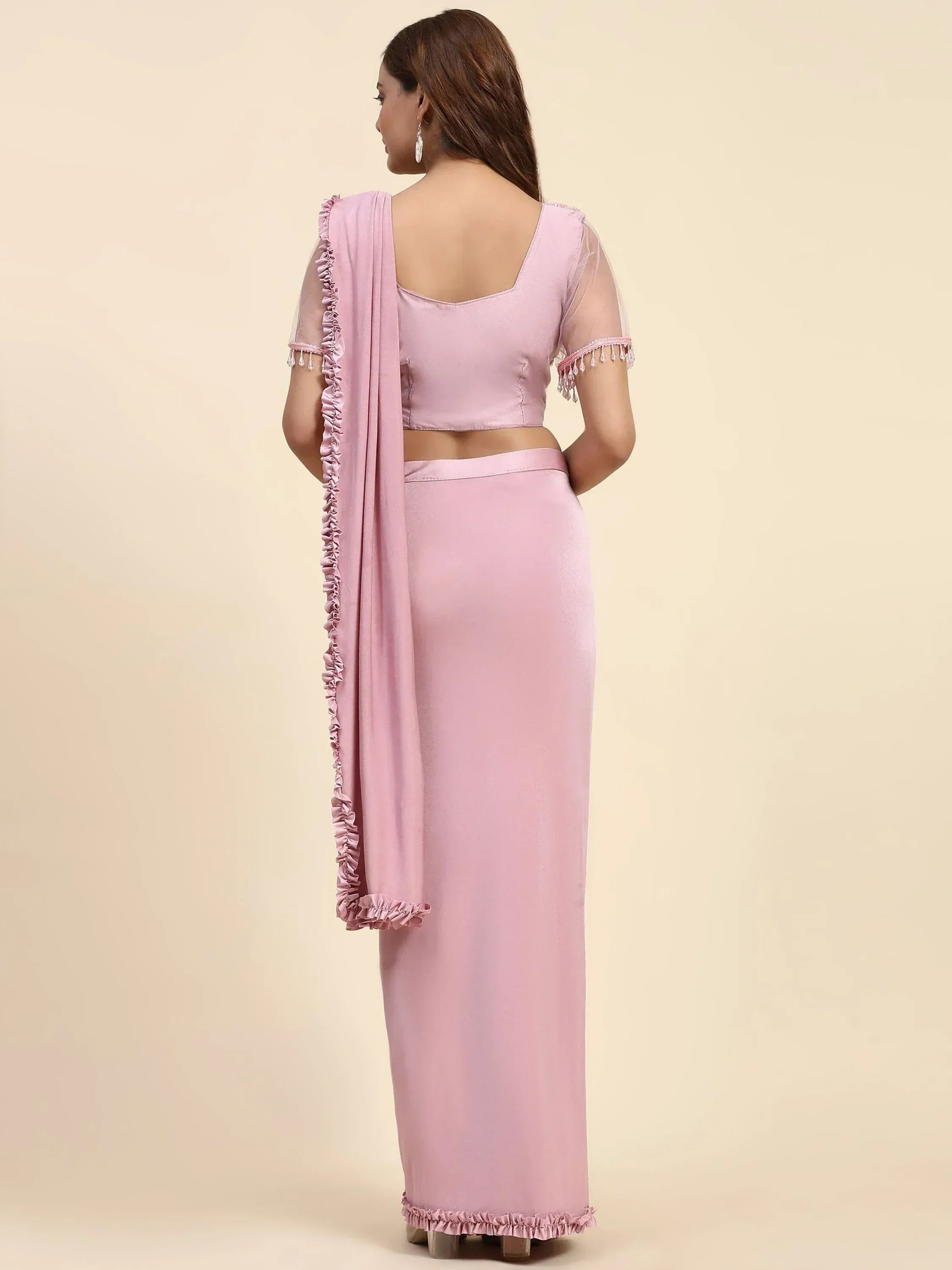 Pink ethnic saree gown with ruffled sleeves and dupatta, perfect for Indian occasions