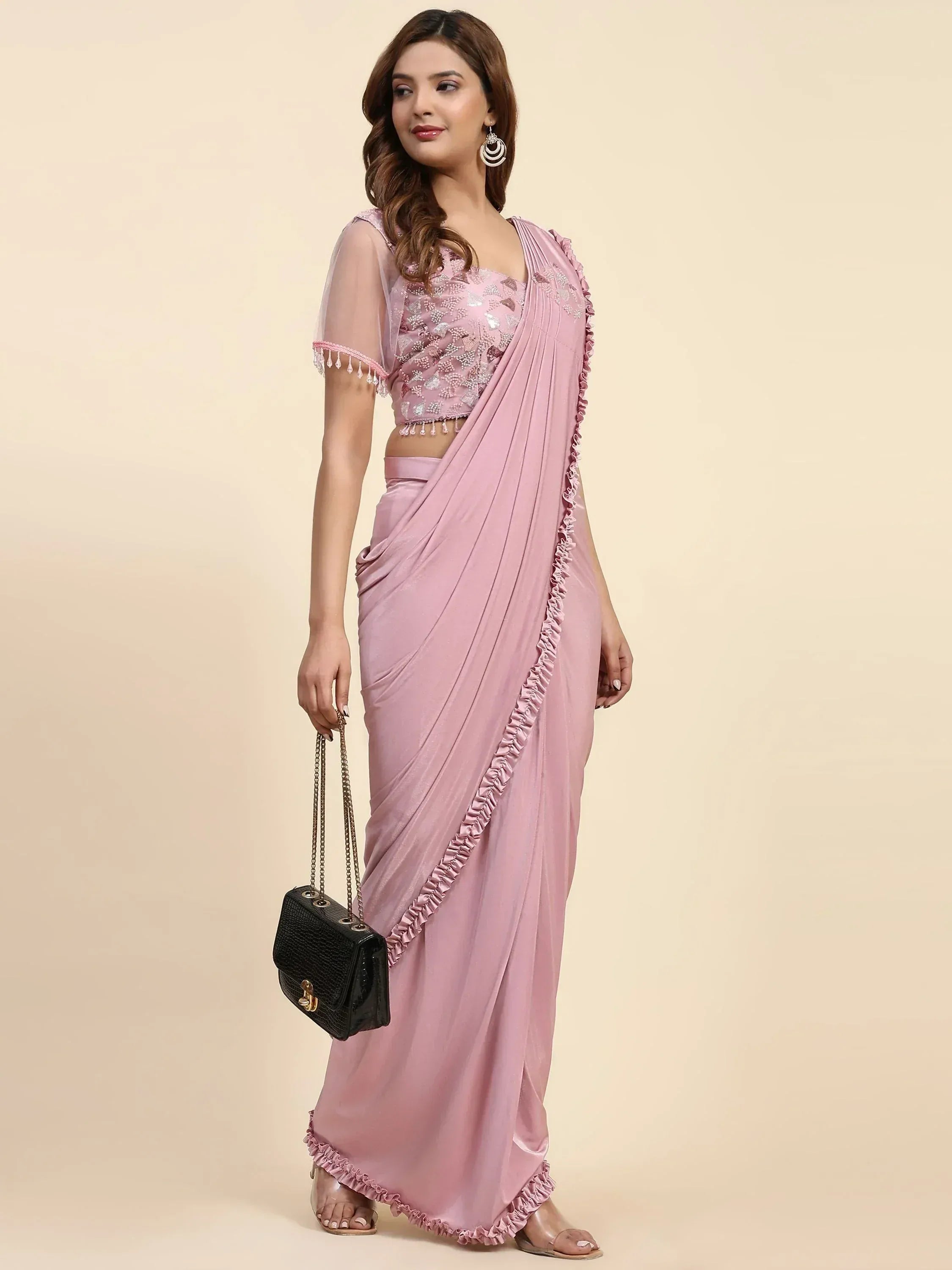 Pink embroidered saree with ruffled border and sheer blouse, Indian ethnic wear