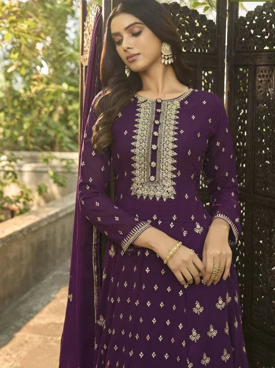 Purple embroidered ethnic anarkali suit with gold detailing, perfect for Indian occasions