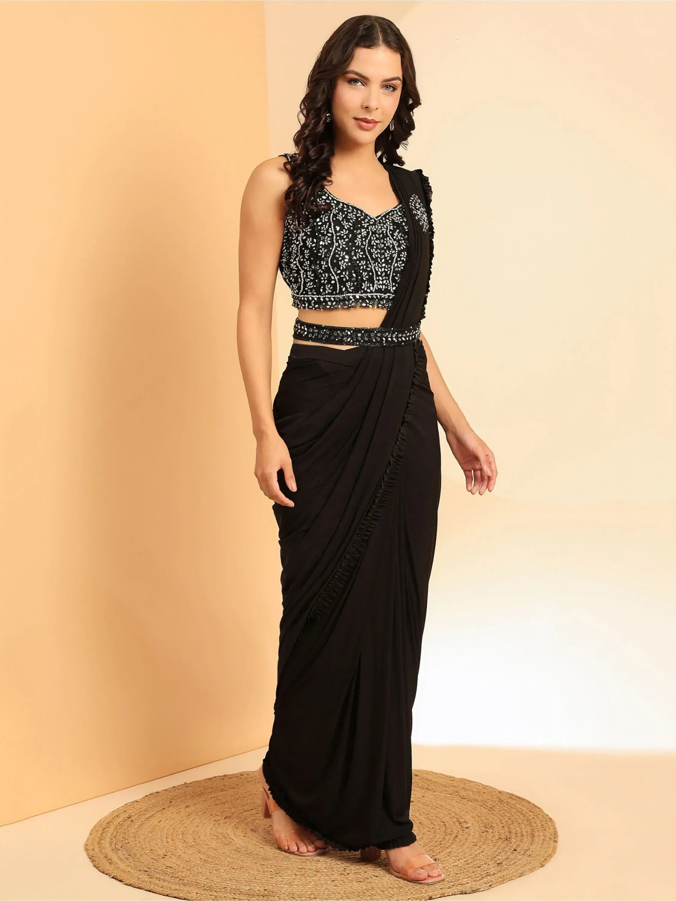 Black embroidered saree gown with ruffled detailing, perfect for Indian ethnic wear occasions