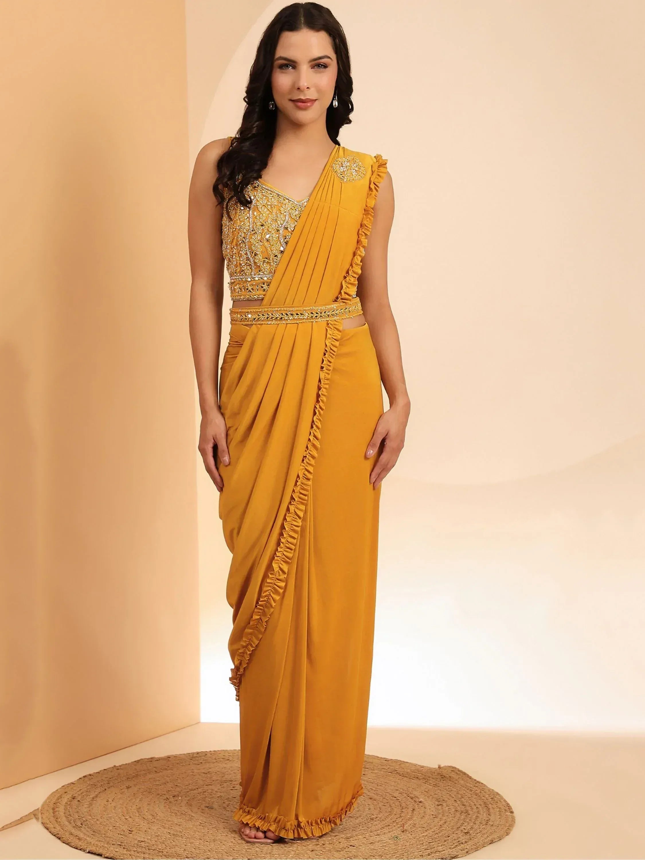 Mustard yellow designer saree with ruffle detailing and embellished blouse, ethnic wear for women