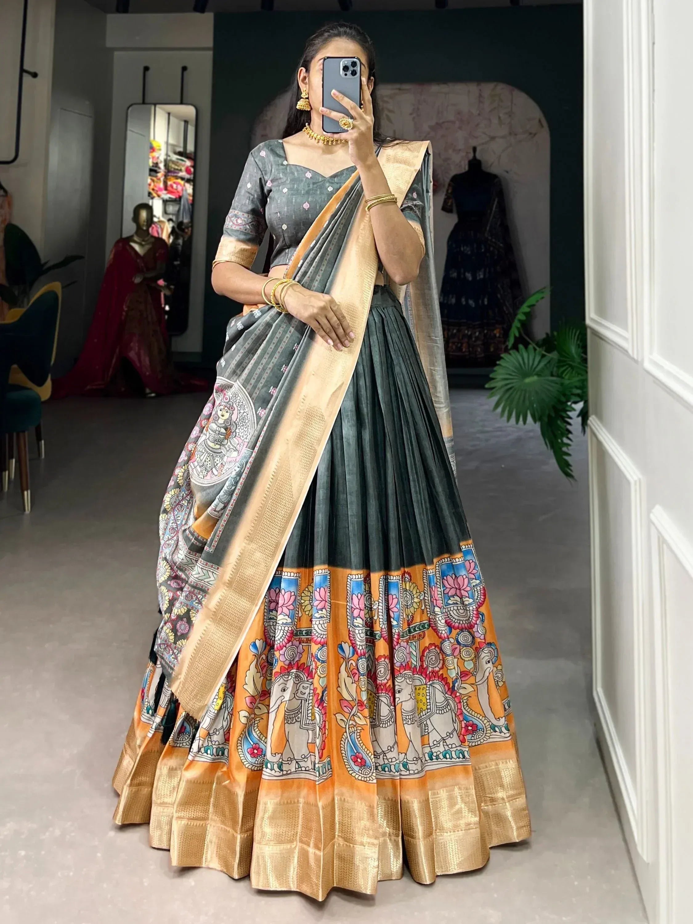 Grey and orange printed lehenga choli with elephant motifs, perfect for Indian ethnic wear occasions