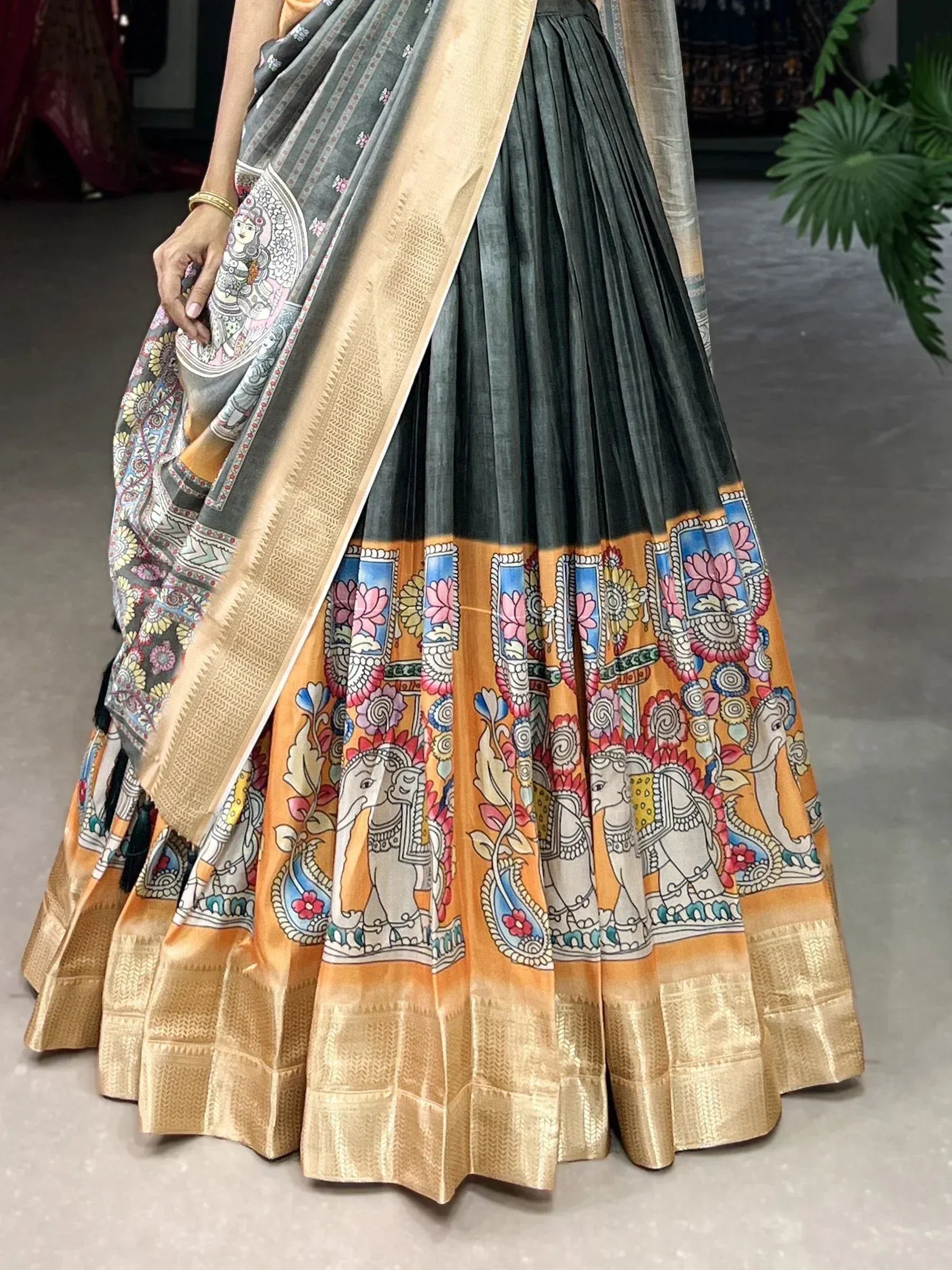 Grey and gold saree with elephant and floral prints, traditional Indian ethnic wear