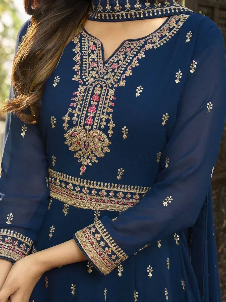 Navy blue embroidered ethnic kurti with gold and pink detailing, perfect for Indian festive wear