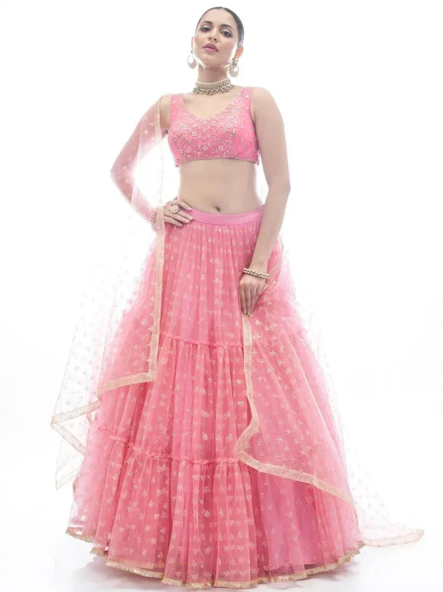 Pink embroidered lehenga choli with net skirt and dupatta, perfect for Indian weddings and festive occasions