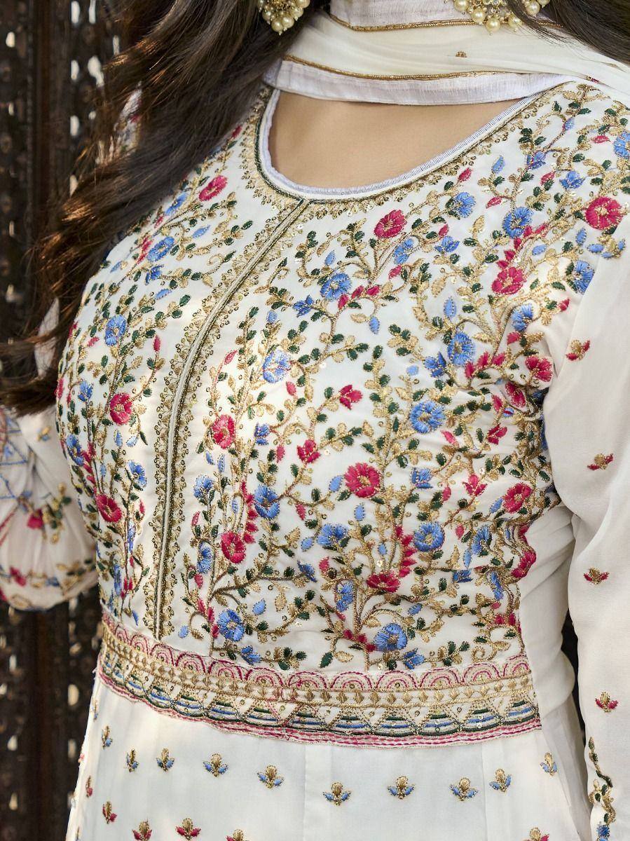 White embroidered salwar kameez with floral zari work, perfect for Indian ethnic wear