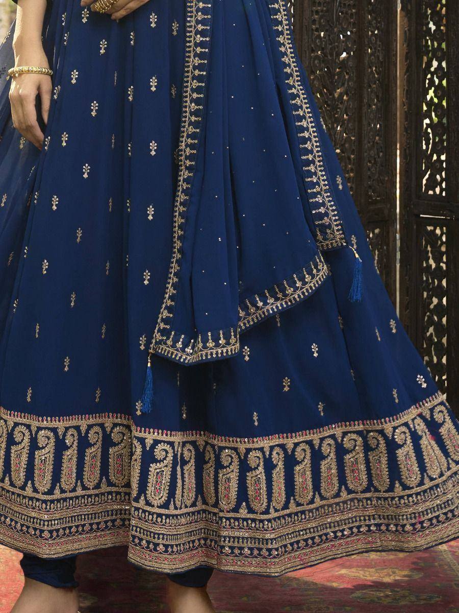 Navy blue designer lehenga choli with gold embroidery and tassels, ethnic Indian wear