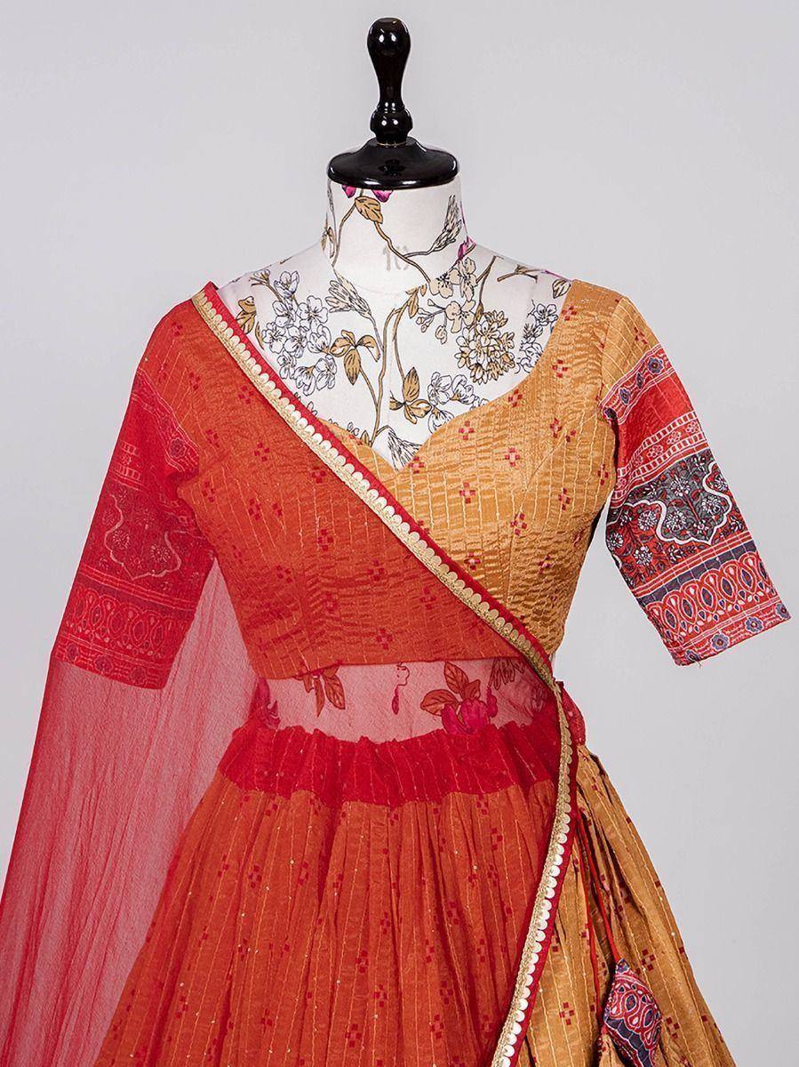 Orange and red printed lehenga choli with floral dupatta, ethnic Indian wear for women