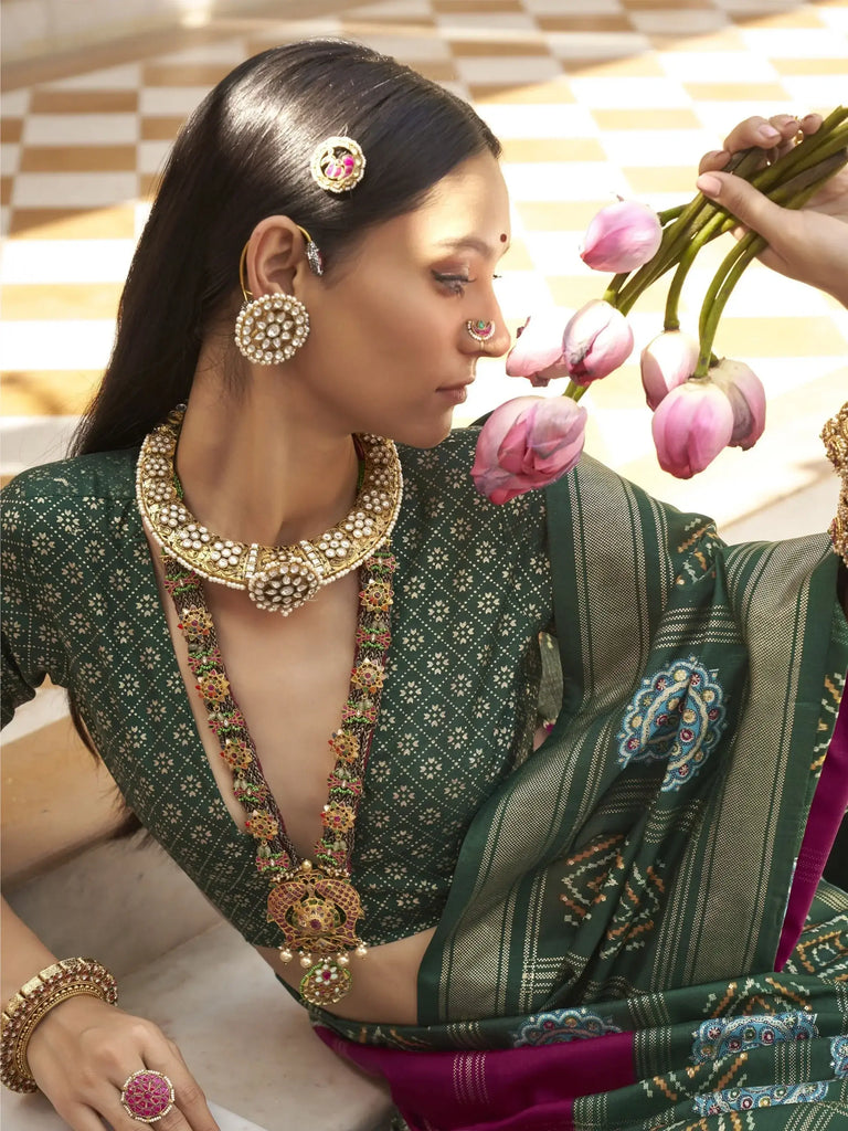 Attractive Purple And Green Silk Patola Festival Wear Saree With Blouse