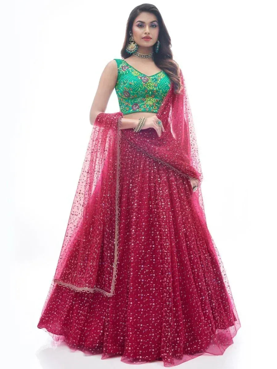 Emerald green embroidered blouse with maroon sequin lehenga choli, perfect for Indian weddings and festive occasions