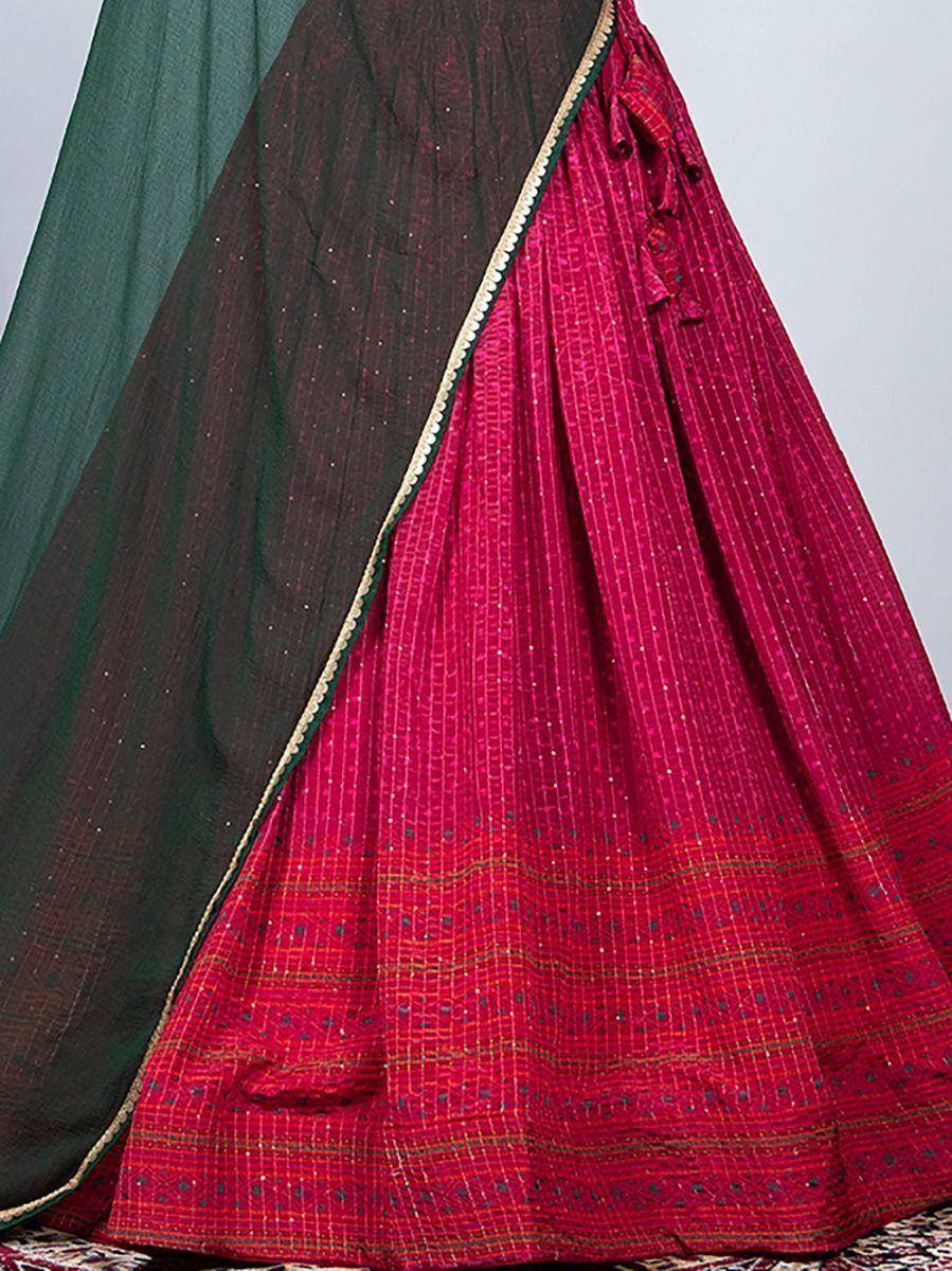 Pink and green ethnic lehenga choli with embroidered dupatta, perfect for Indian weddings and festivals