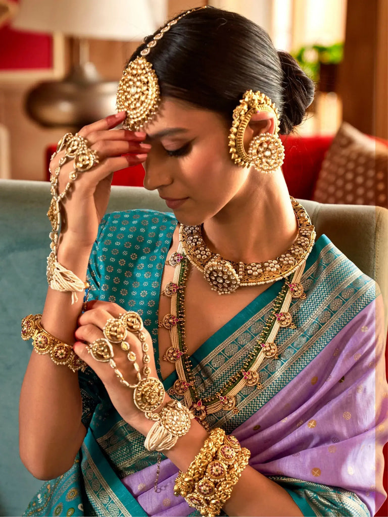 Theatrical Lavender Patola Printed Silk Wedding Wear Saree With Blouse