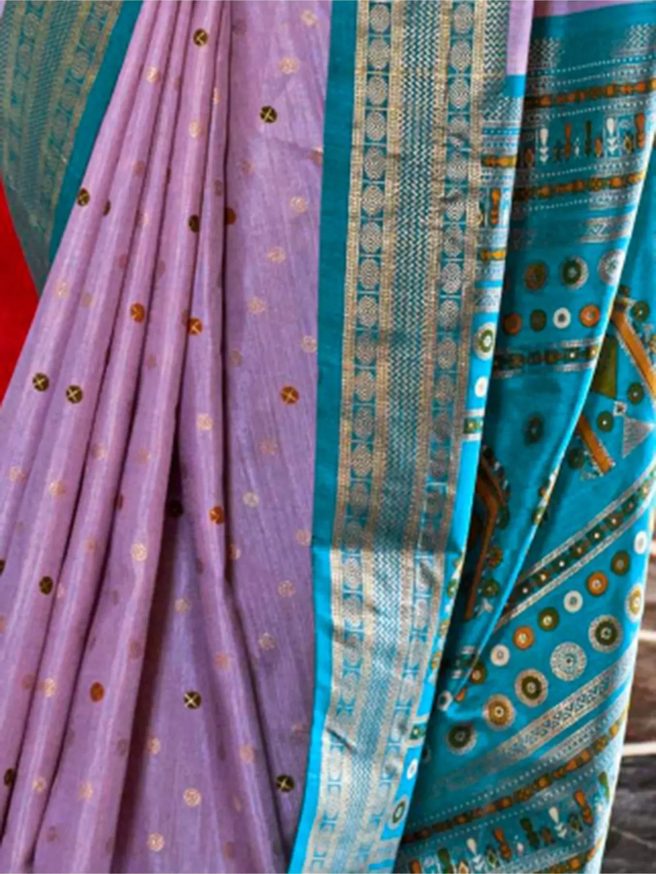 Purple and teal Indian sarees with gold embroidery and traditional patterns, perfect for ethnic wear