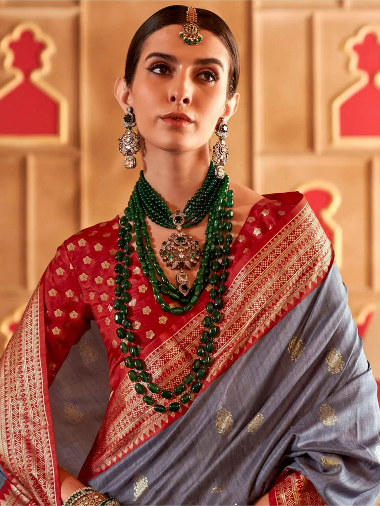 Startling Dusty Blue Patola Printed Silk Wedding Wear Saree With Blouse