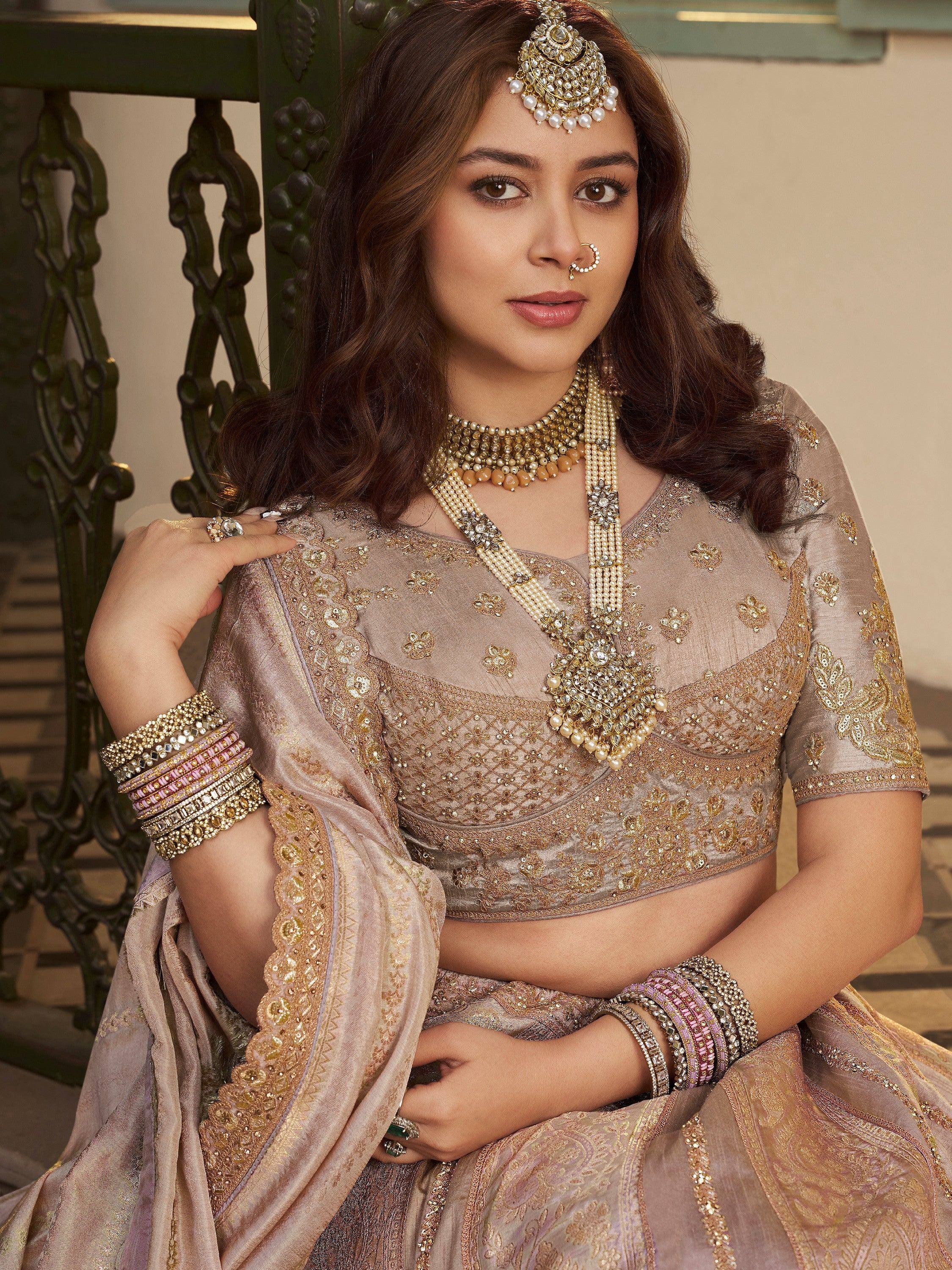 Enchanting Peach Embroidered Silk Wedding Wear Lehenga Choli
