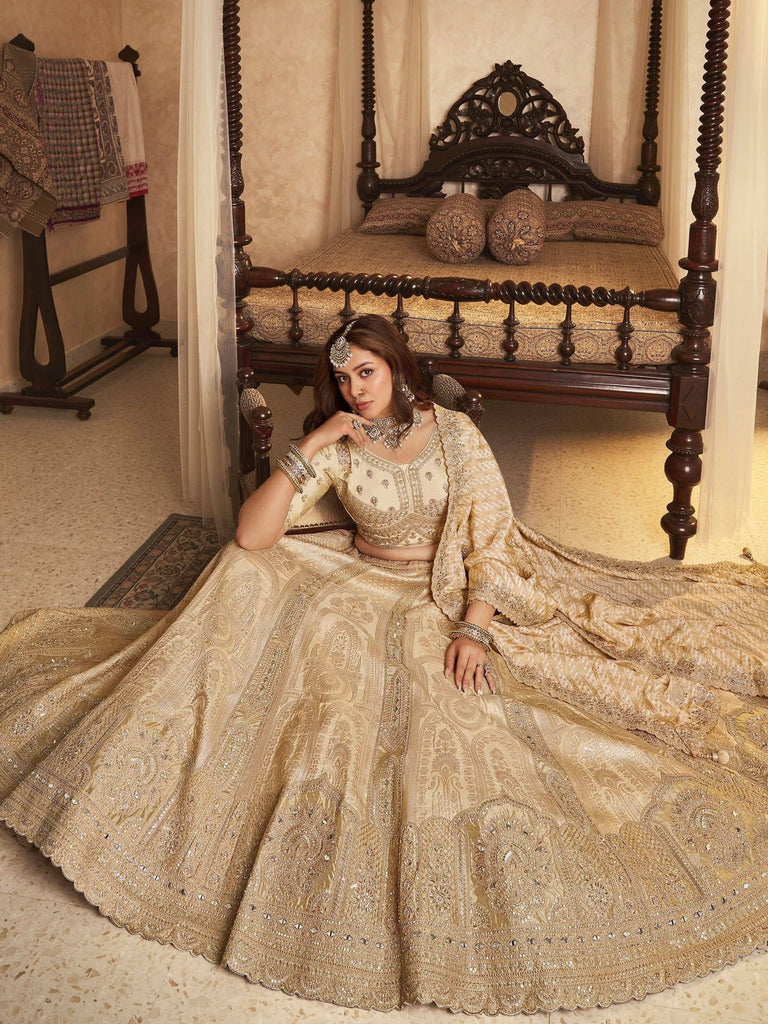 Fascinating Beige Embroidered Silk Wedding Wear Lehenga Choli