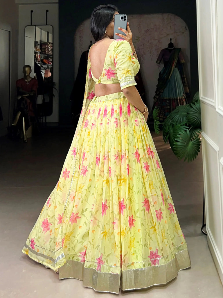 Impressive Yellow Floral Printed Silk Haldi Wear Lehenga Choli