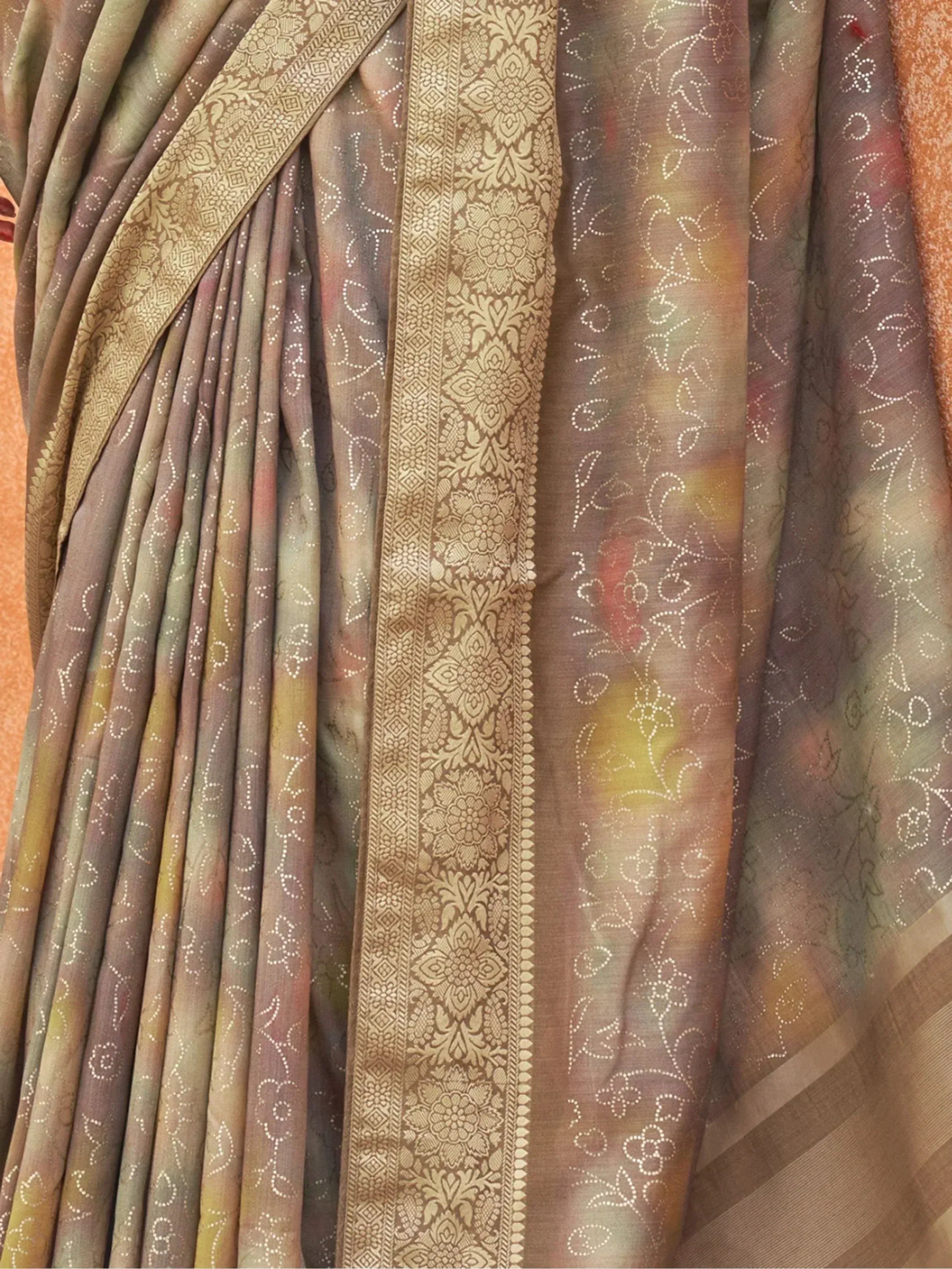 Elegant Indian saree with intricate gold border and floral motifs, perfect for ethnic wear occasions.